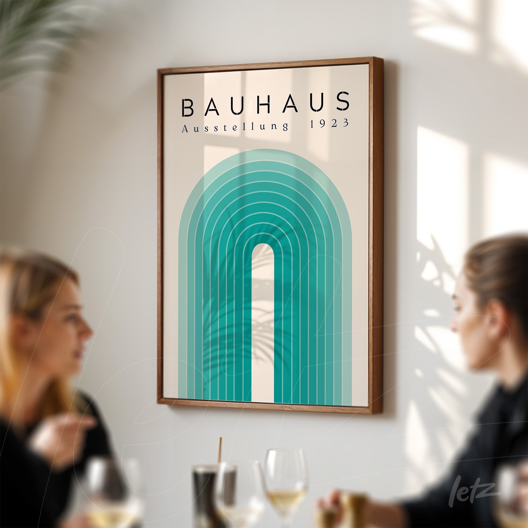 poster print of geometric bauhaus style art with green arch framed in wood displayed on modern lounge wall