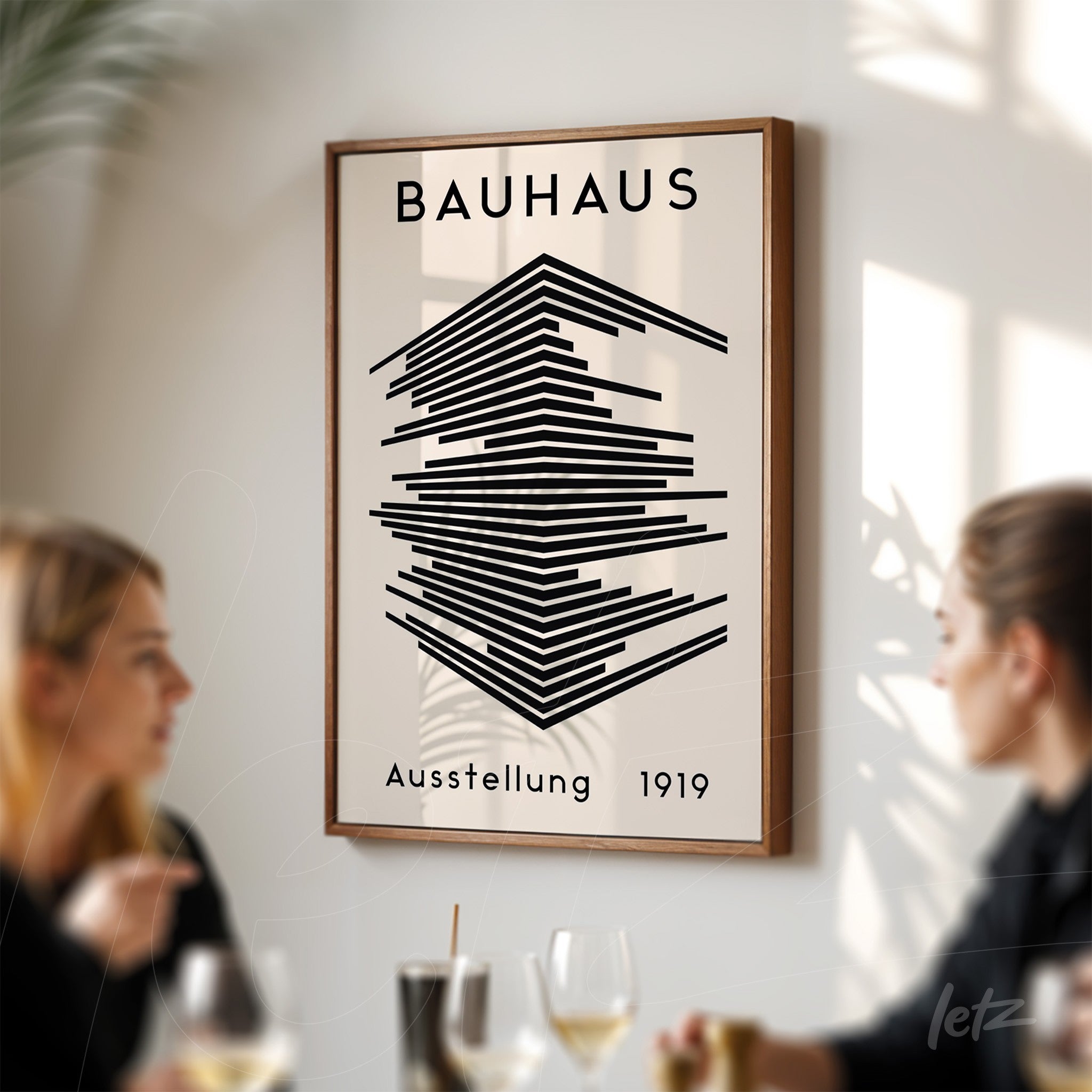 printed poster with black and white geometric bauhaus style design in wooden frame
