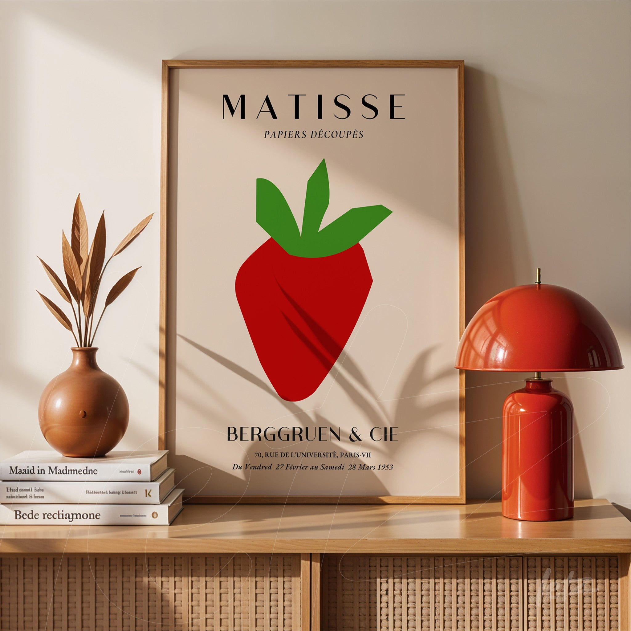 framed modern art piece featuring a stylized strawberry against a neutral background
