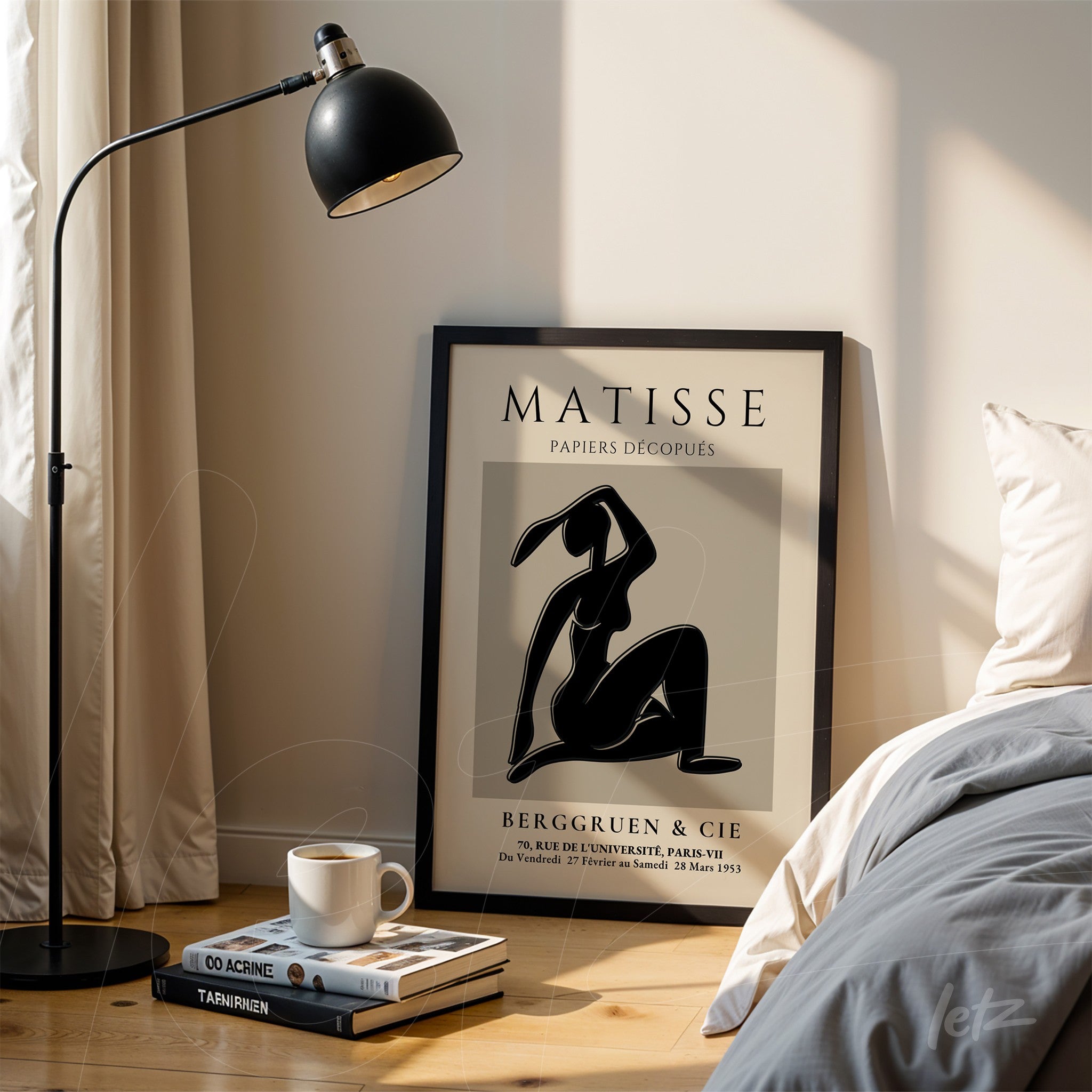 framed modern art depicting a female figure in black, leaning against a wooden stand next to a floor lamp