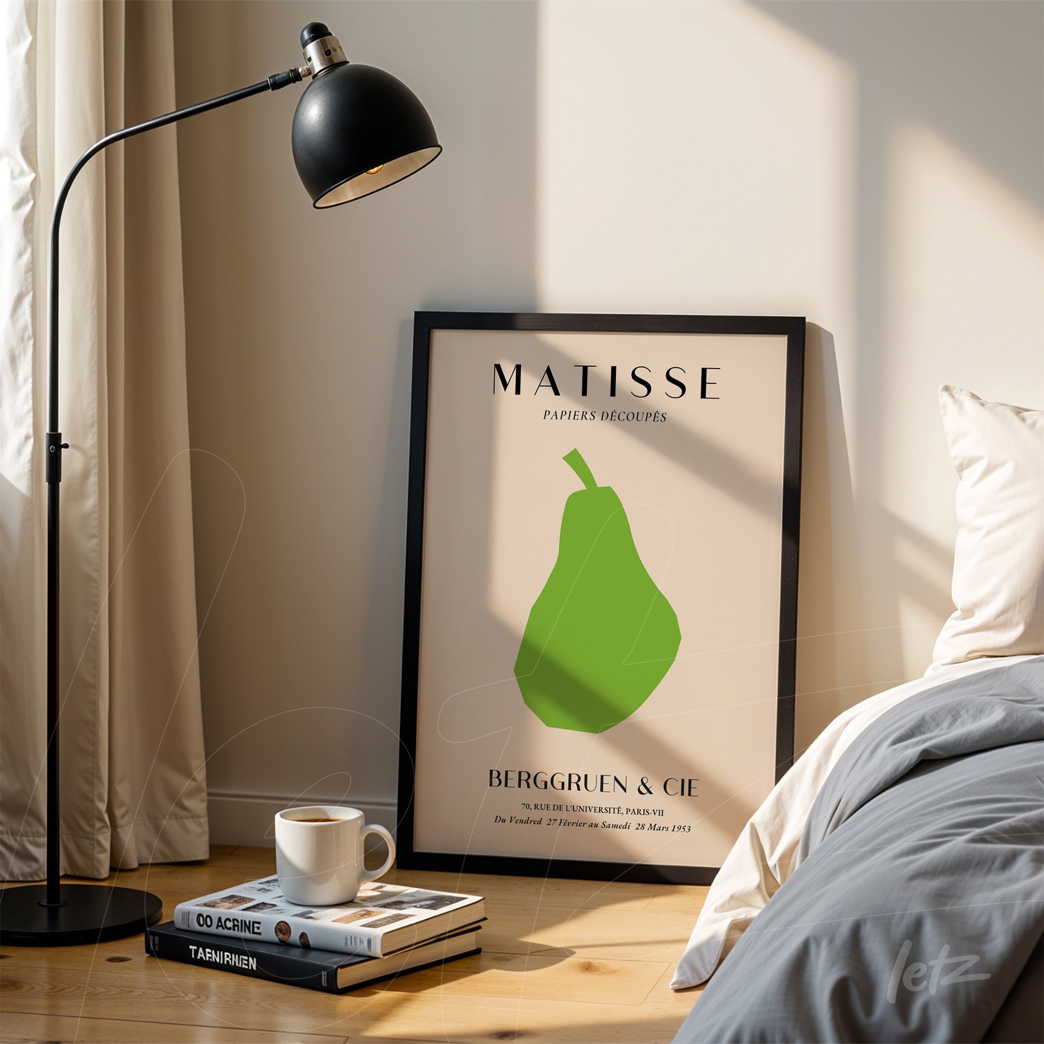 framed wall art featuring minimalist style illustration of a green pear in a black frame, leaning next to a floor lamp in a contemporary setting