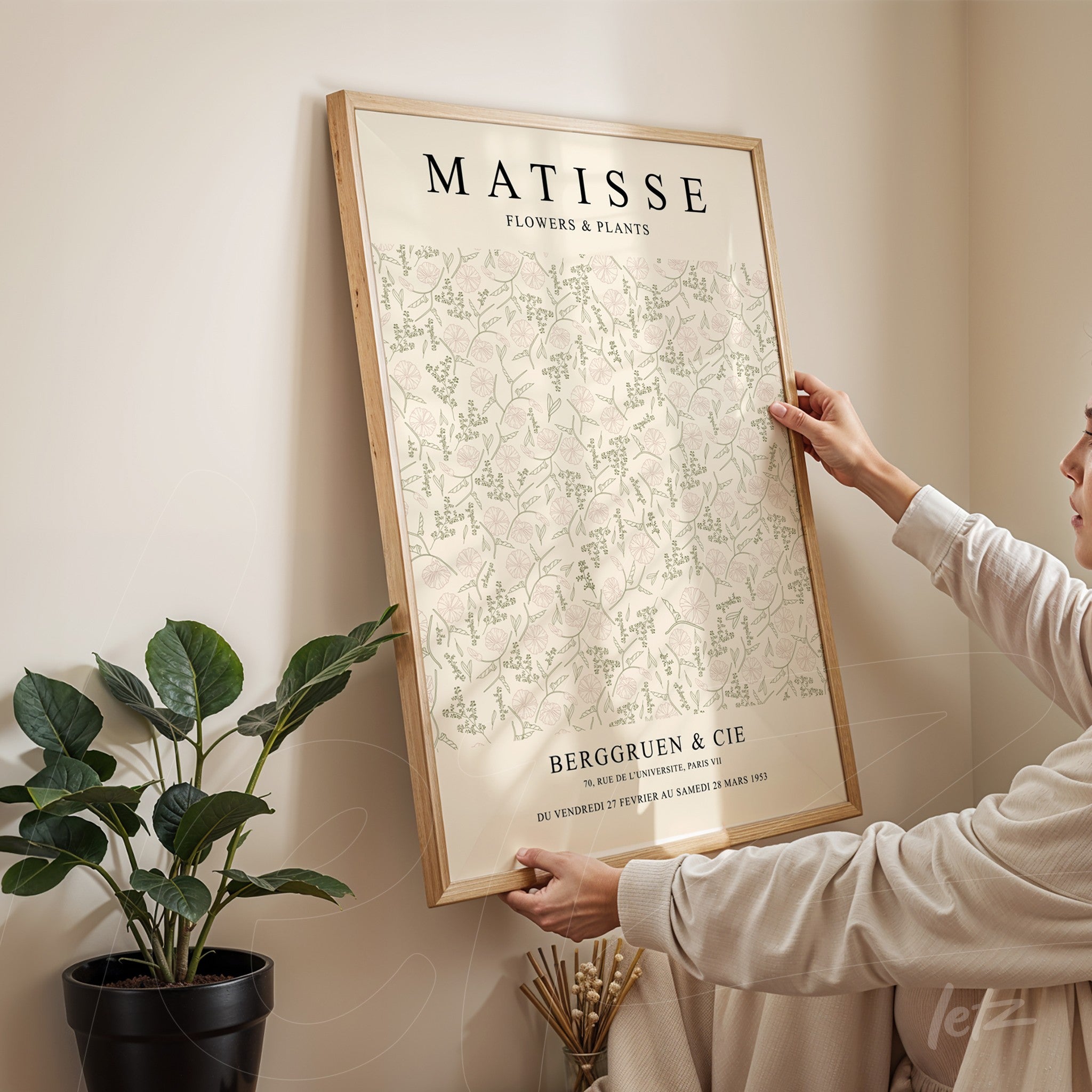 decorative wall art featuring floral design by Matisse, showcased in light wooden frame against neutral wall