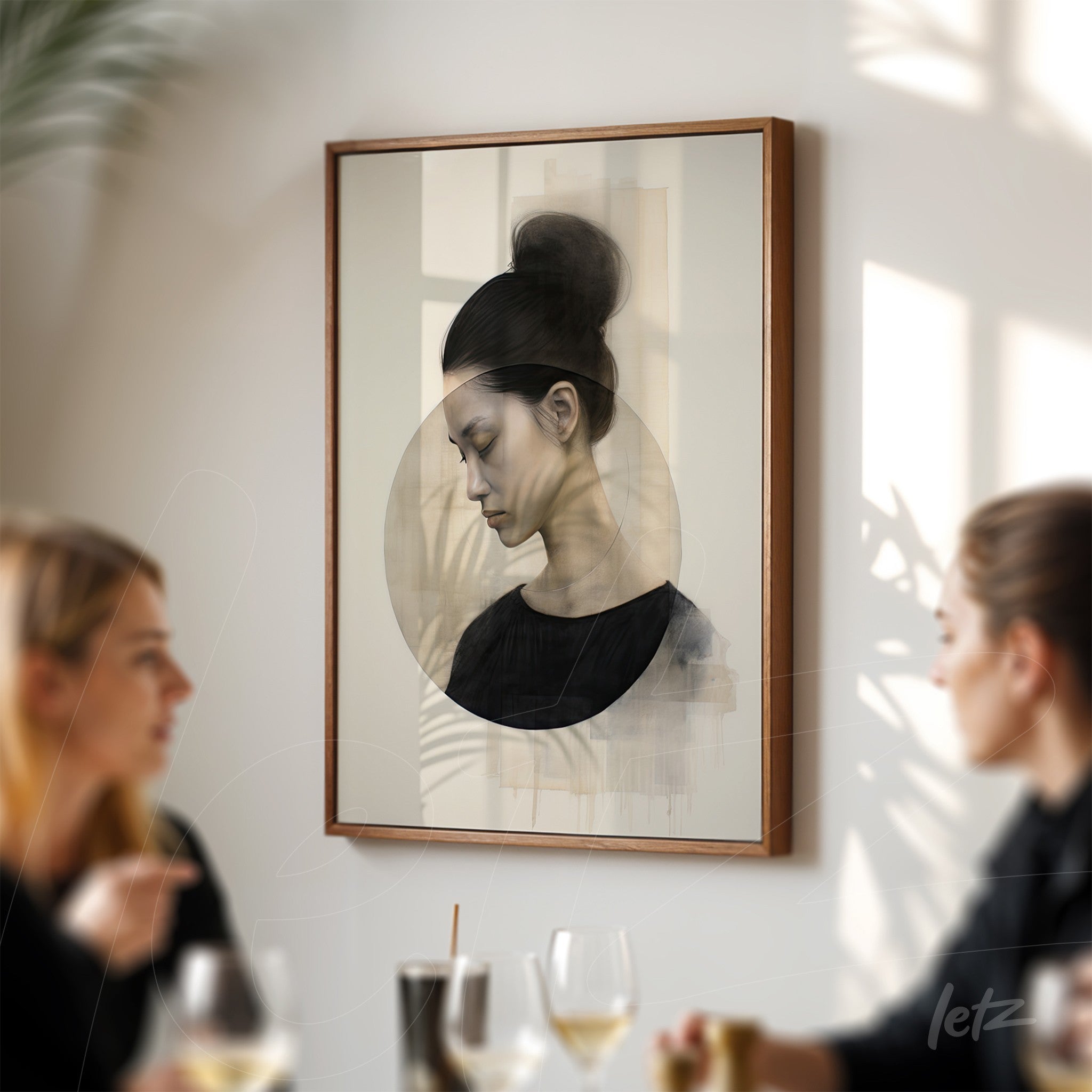 framed wall art featuring a profile portrait of a woman in soft tones with a light wooden frame
