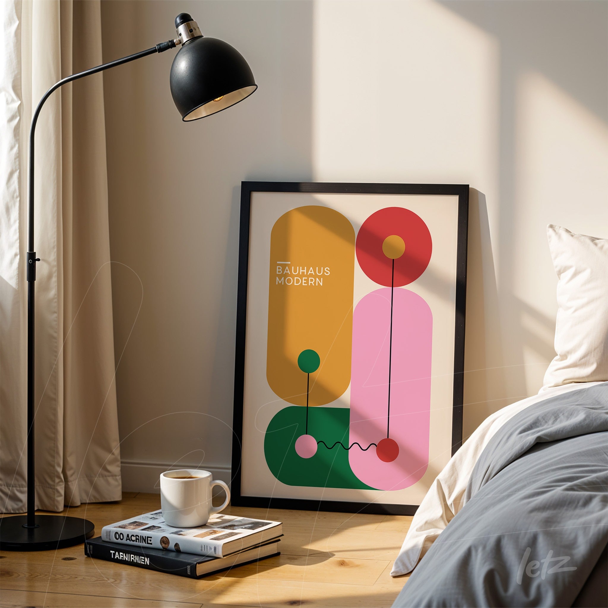 bauhaus style modern art with colorful geometric shapes in black frame resting on wooden floor beside lamp and books