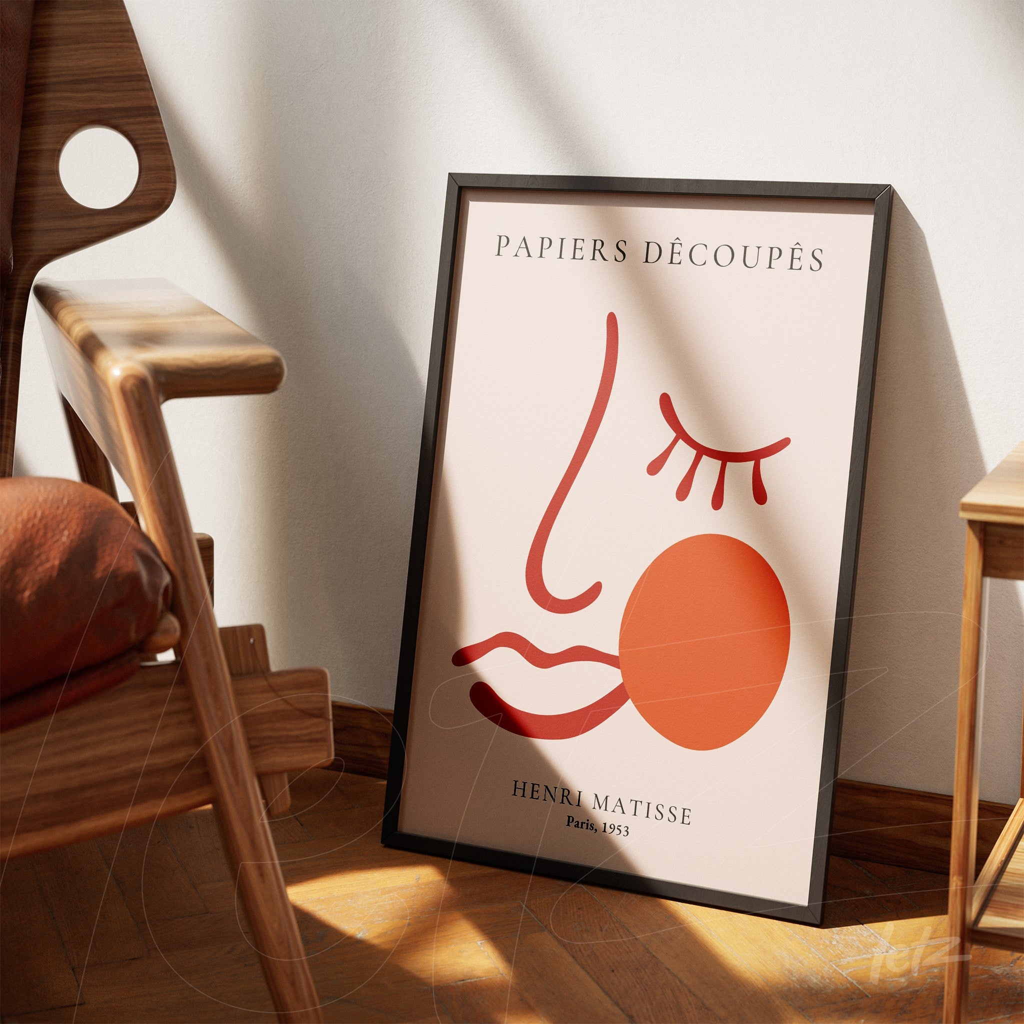 framed minimalistic art print of a red line face with organic shapes on a light background