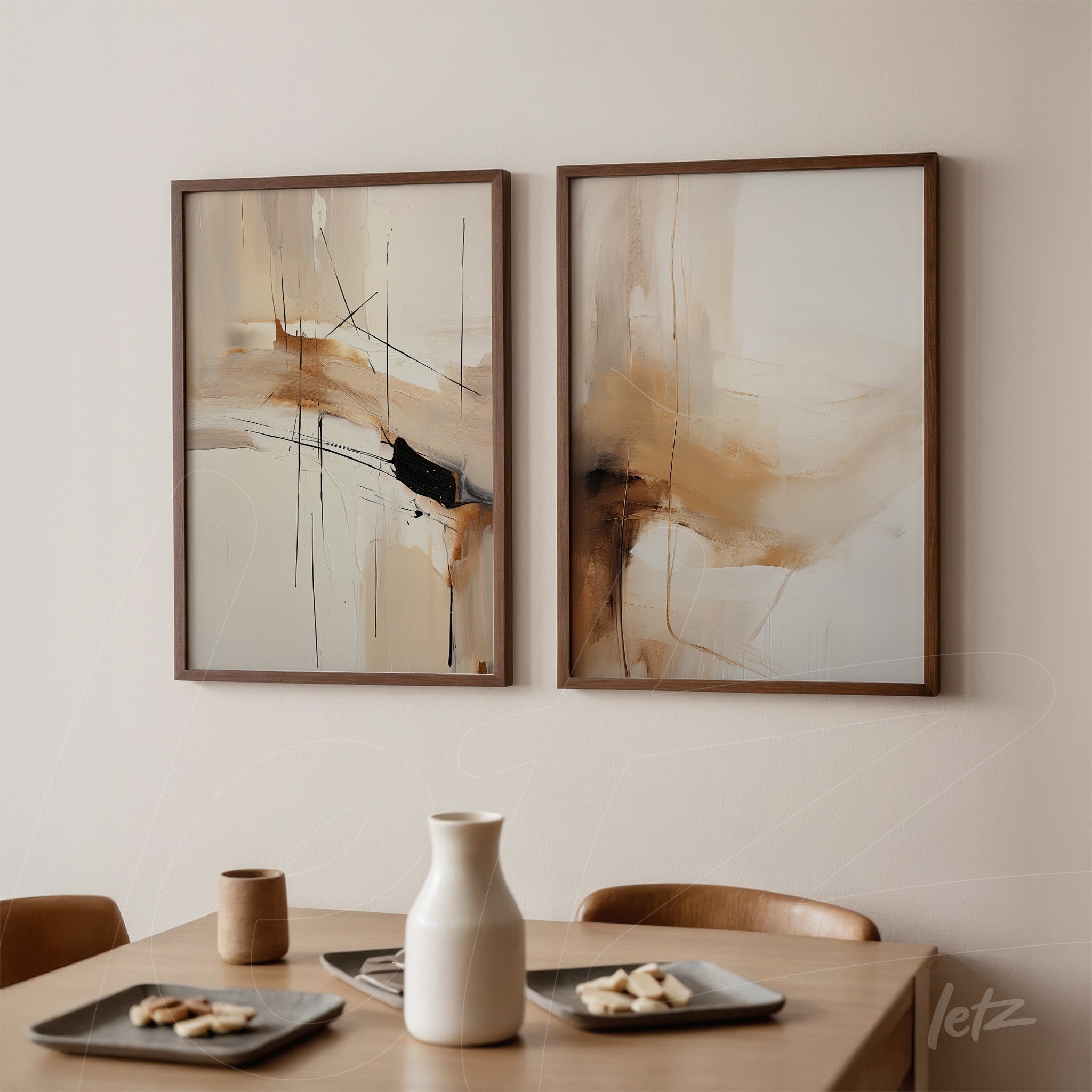 composition of two artworks with abstract design in earthy tones, dark wood frames displayed on a light wall