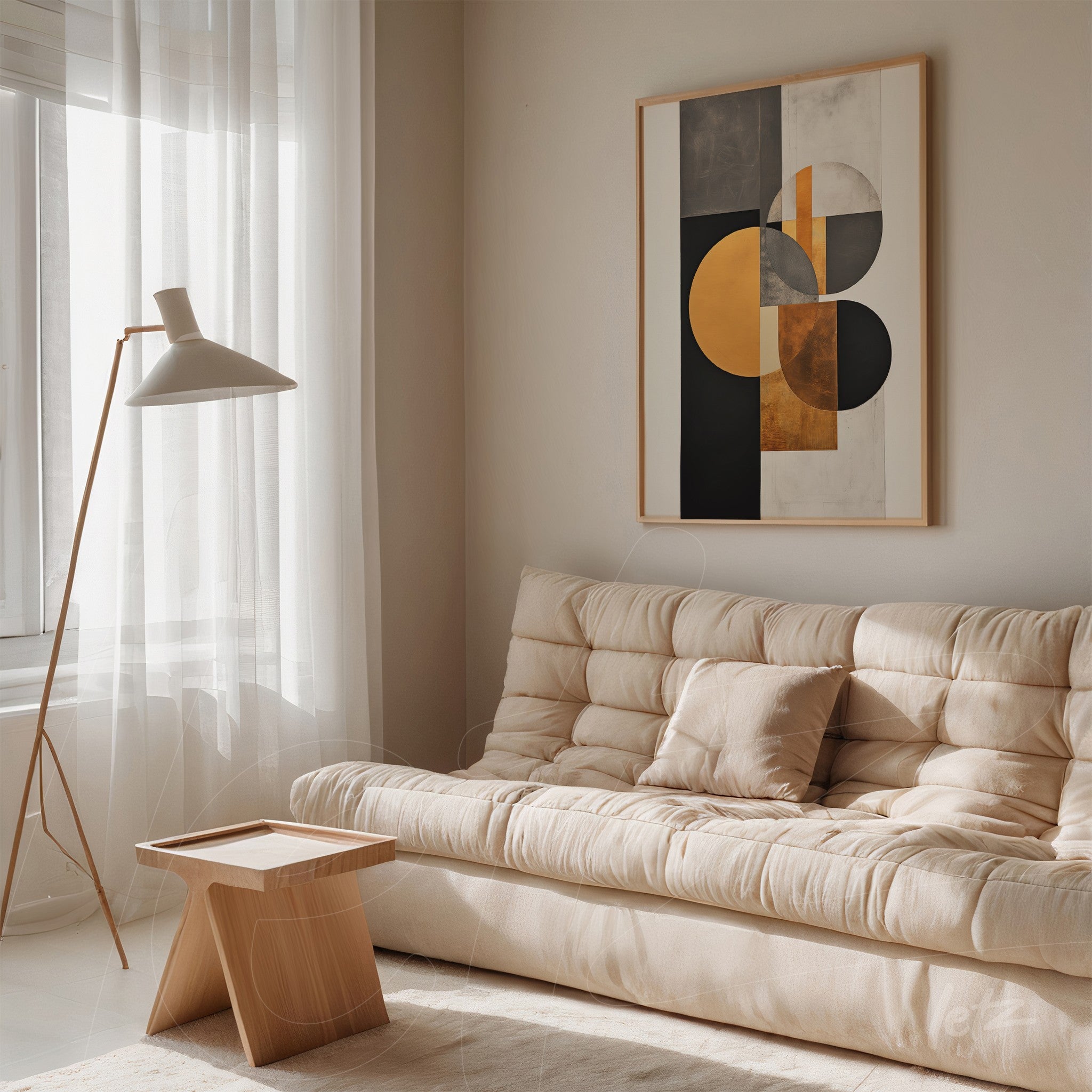 abstract wall art featuring geometric shapes in gold, black, and gray in a light frame displayed on the wall in the background