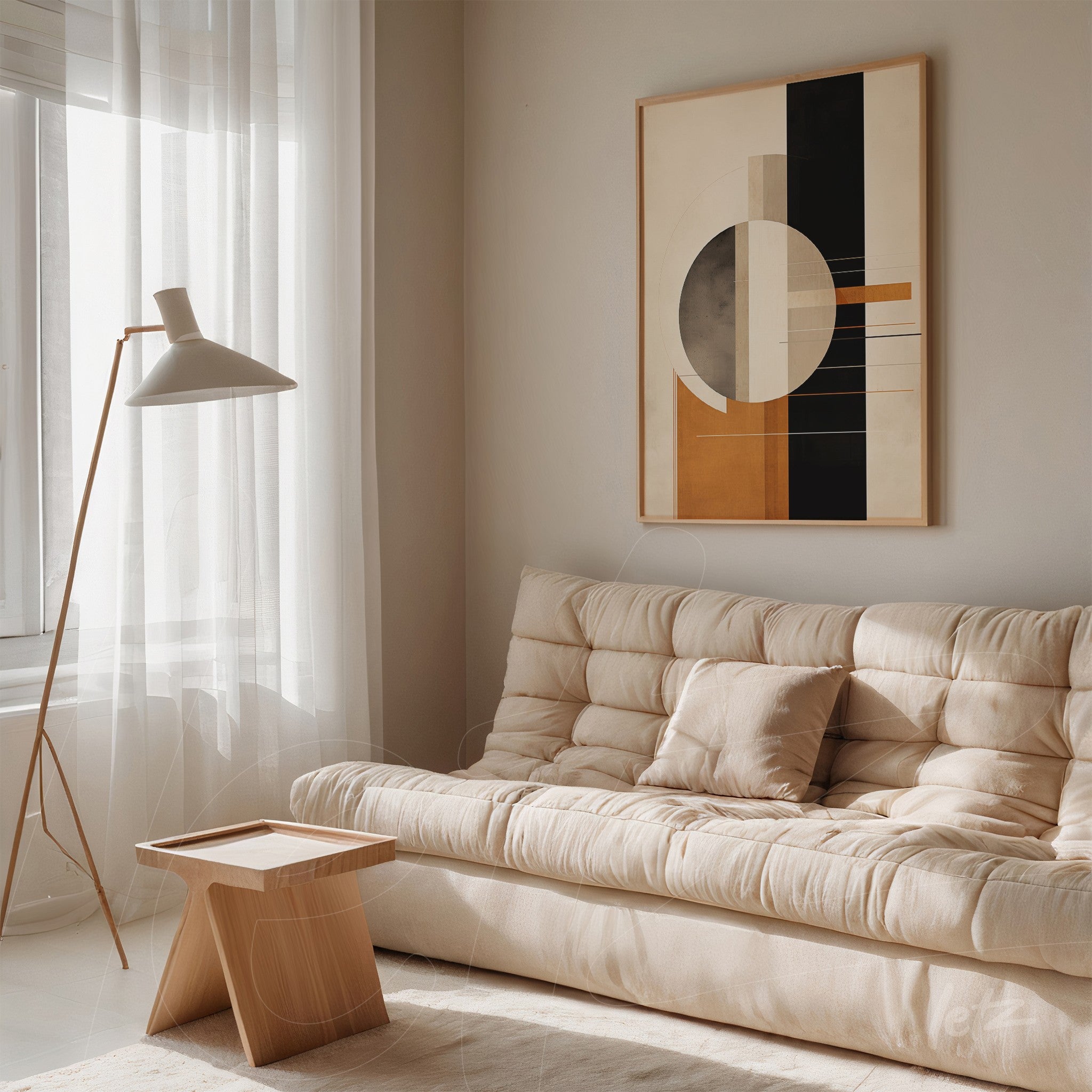 modern framed artwork featuring geometric shapes above a neutral sofa in a bright setting
