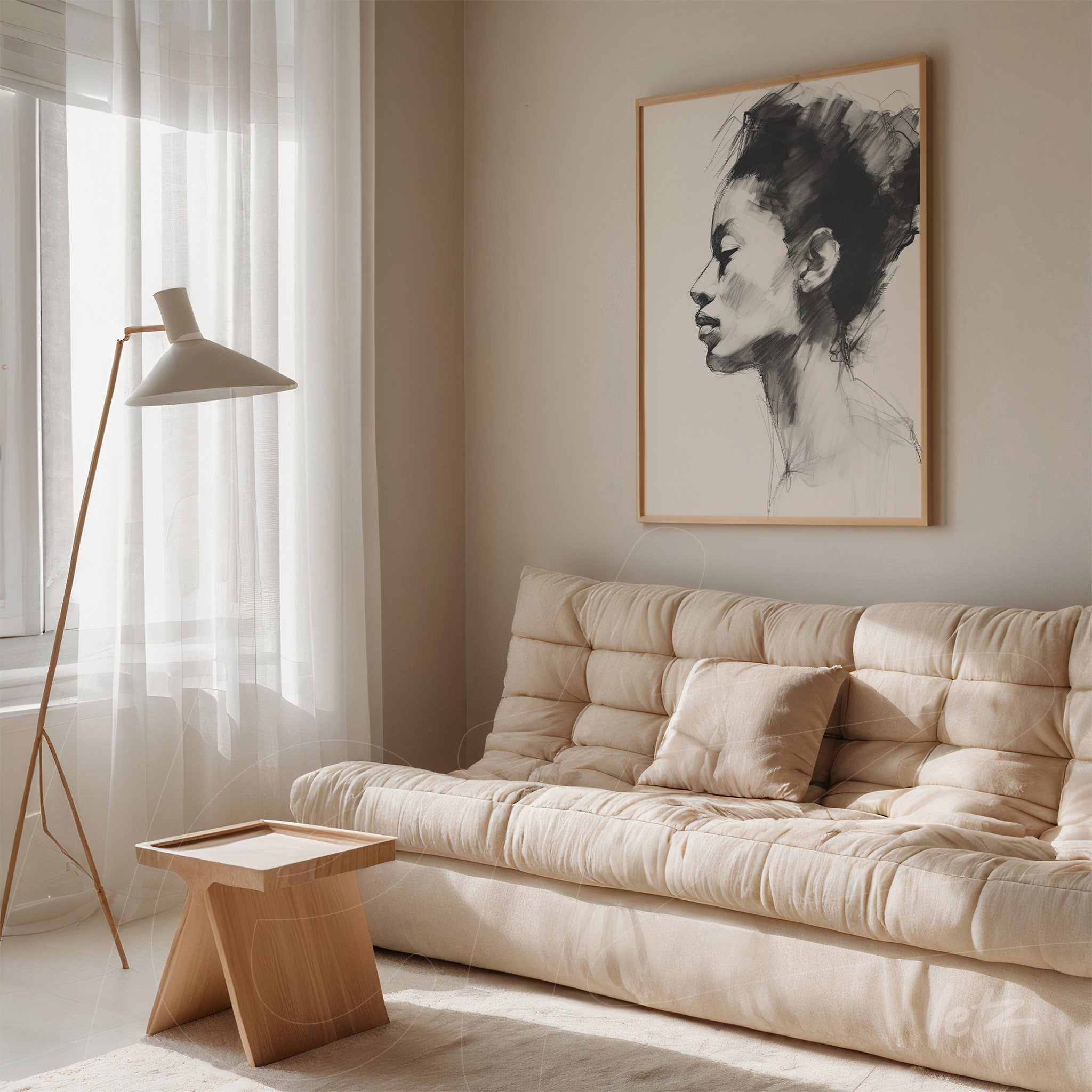 minimalist line art portrait of a woman's profile in light frame displayed above a beige sofa