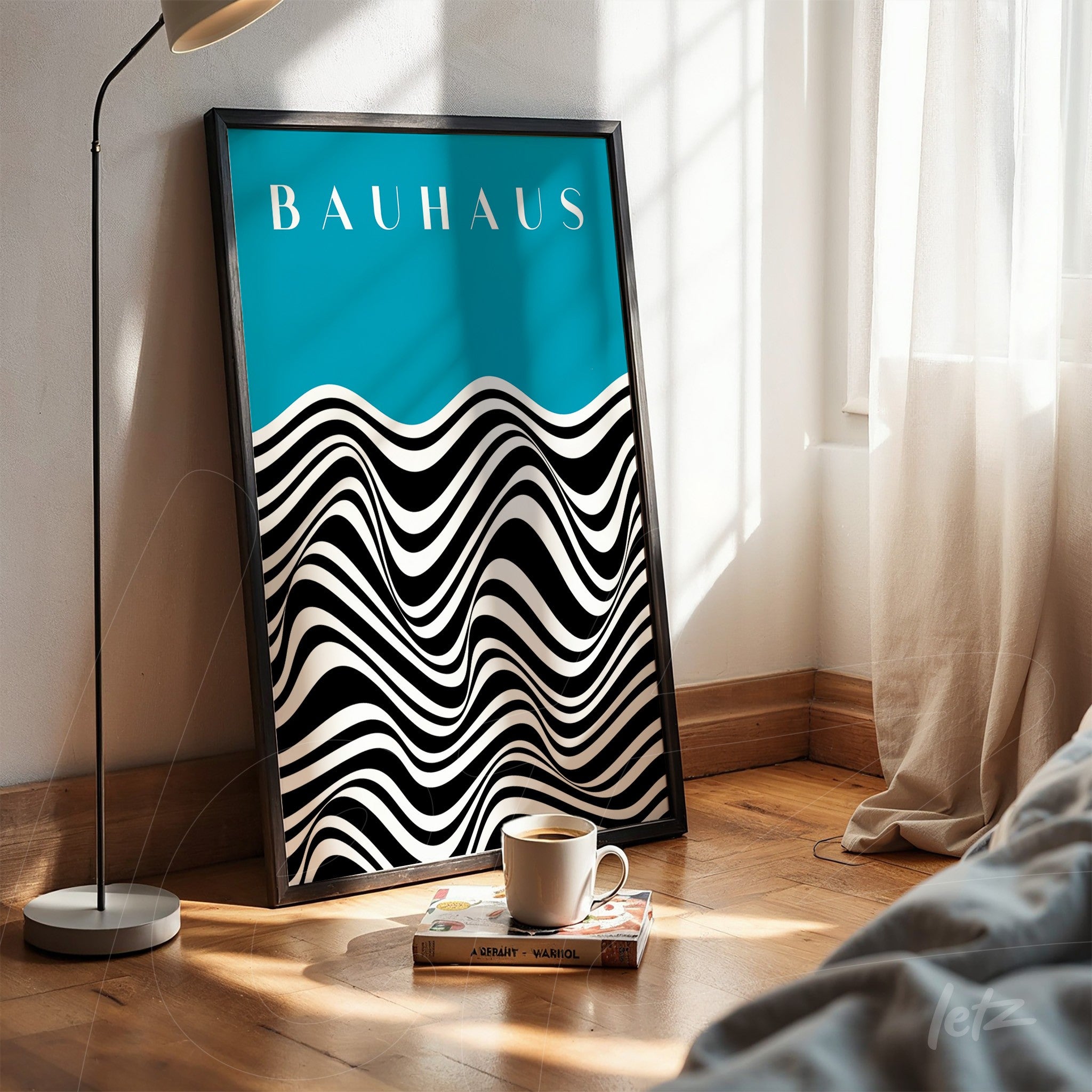 framed op art poster with black and white waves on a blue background, placed on the floor with black frame