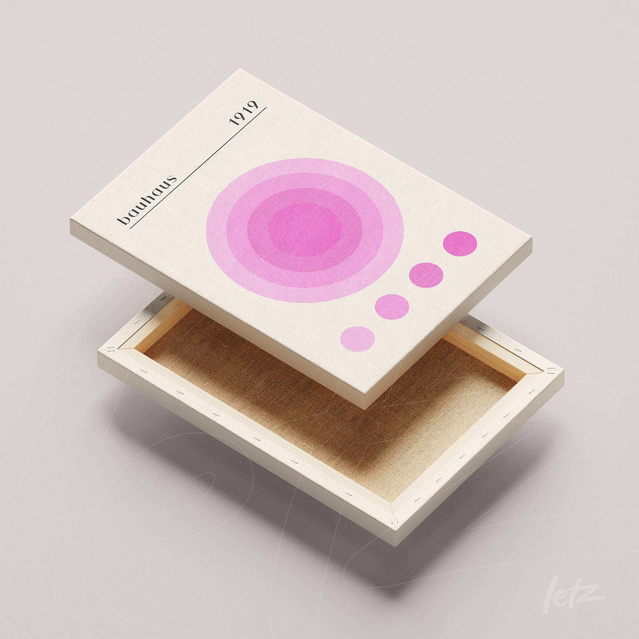 canvas print featuring a minimalist design of pink and lilac circles on a light background, paired with a light wood frame