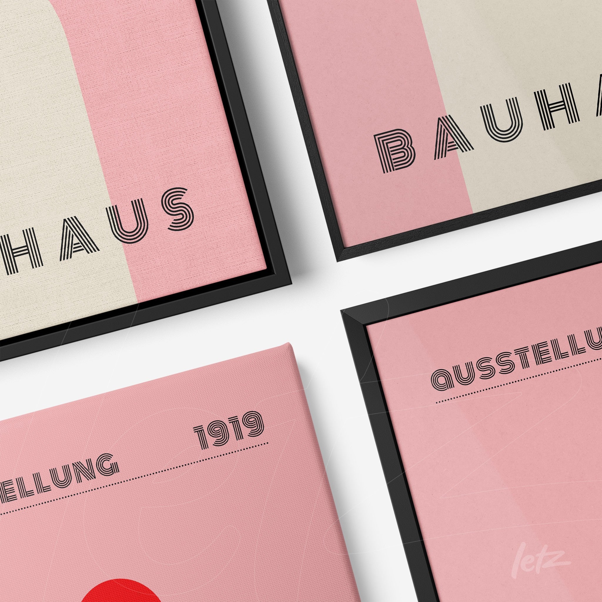 composition with four modern art prints in Bauhaus style with black frame