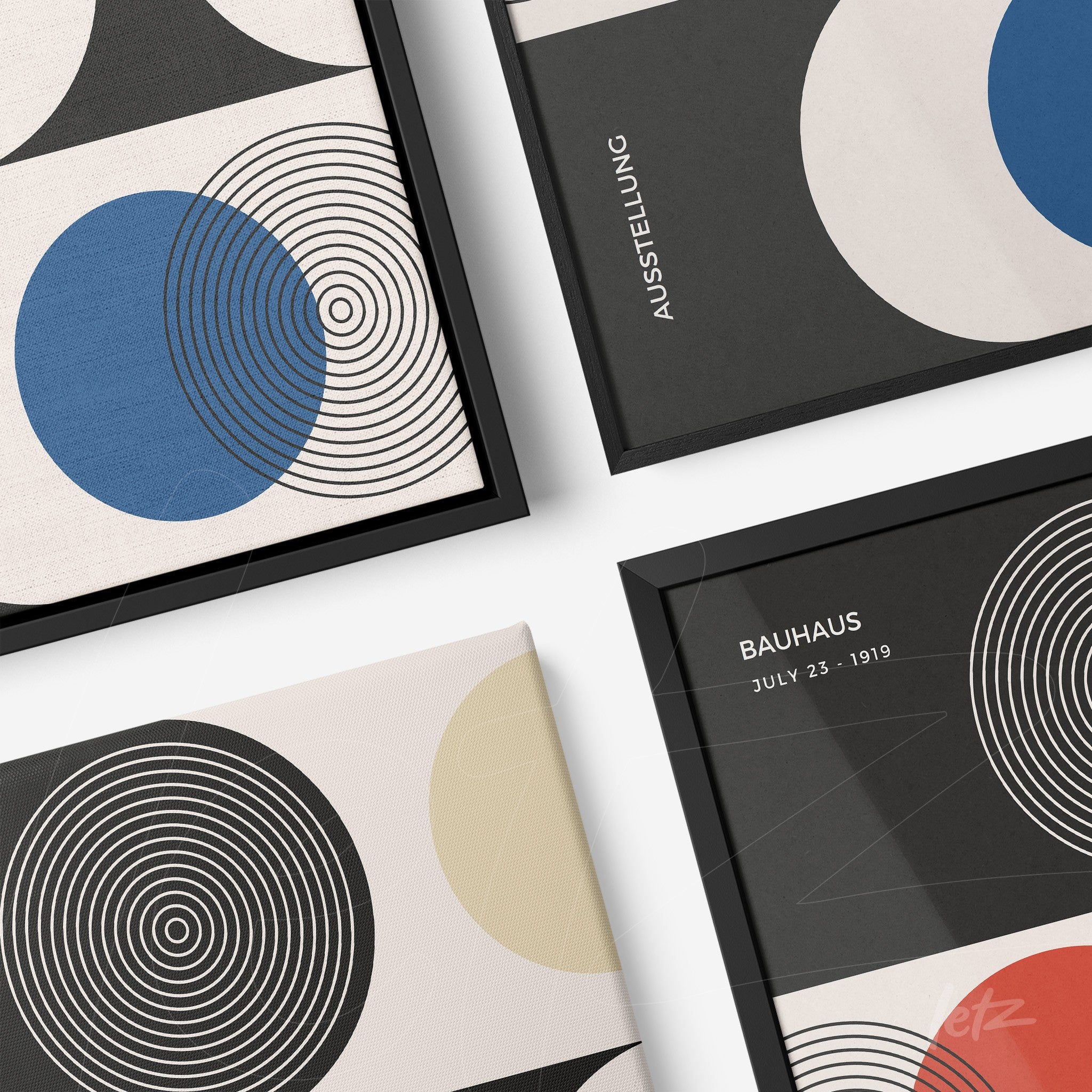 composition with four bauhaus style frames featuring geometric shapes and primary colors, displayed in black frames on a white background