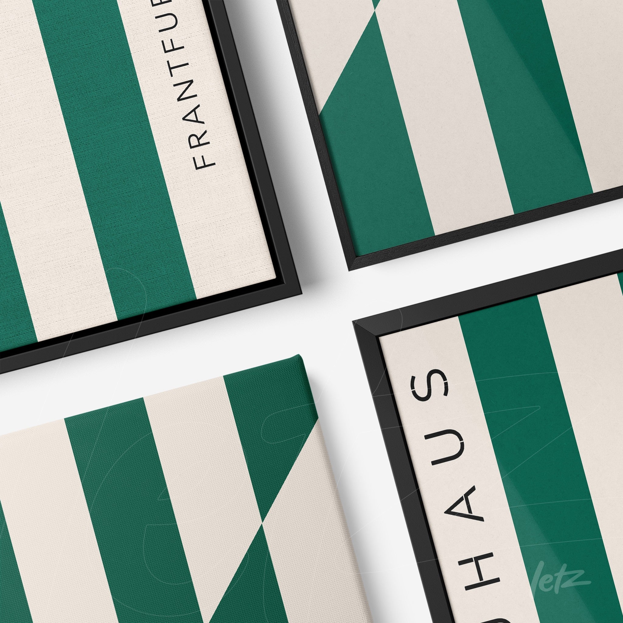 collection of green geometric patterned canvas art with text, each in slim black frames