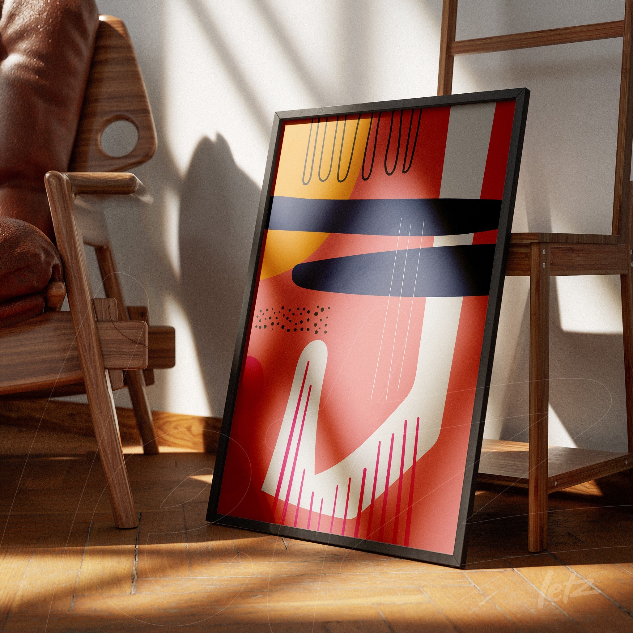 quadro moderno com arte geométrica em tons boho com moldura preta, encostado em cadeira de madeira sobre piso de madeira