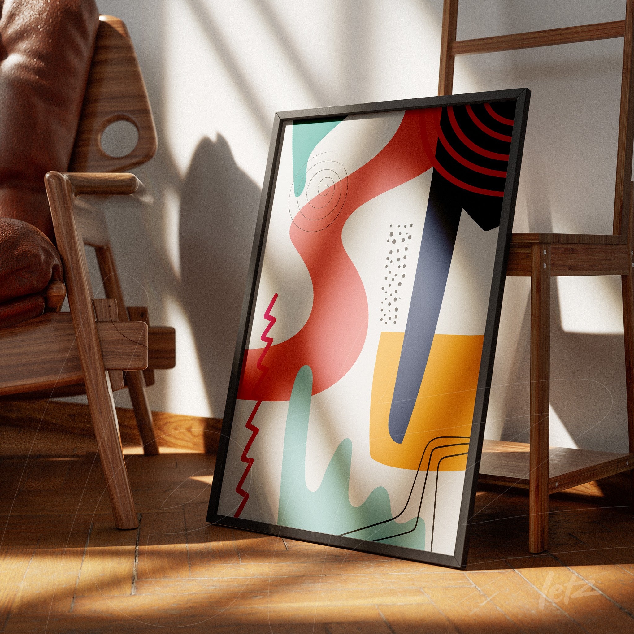 arte abstrata colorida em moldura preta exibida ao lado de cadeira de madeira