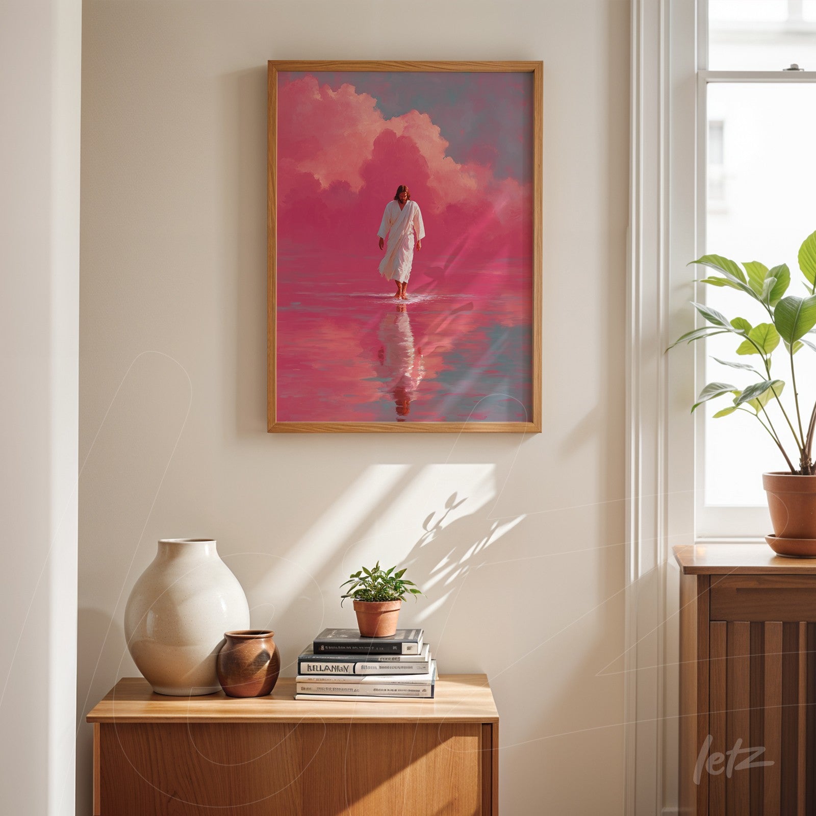 framed digital art in pink hues depicting a figure walking on water, light wood frame, displayed in a minimalist setting