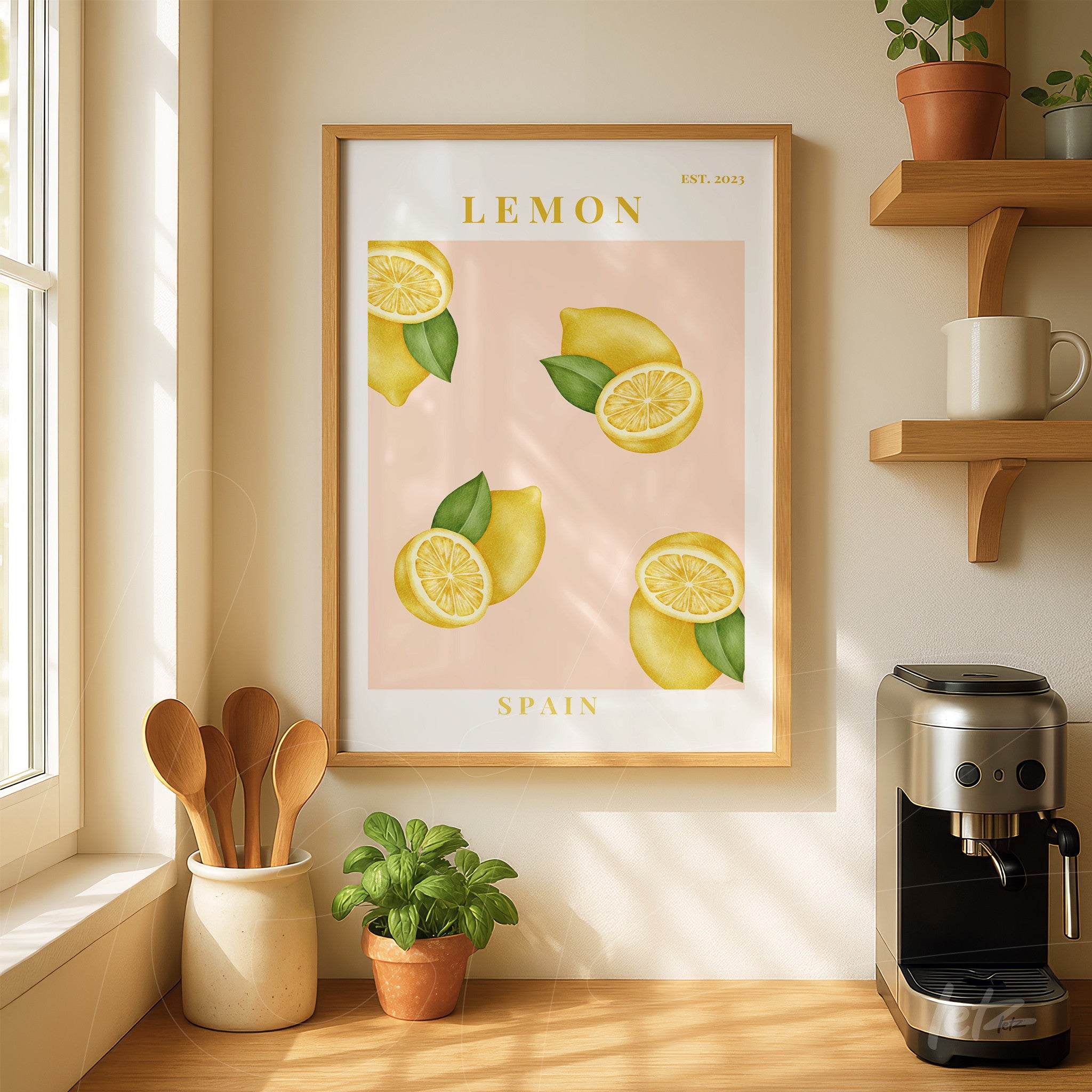 framed art featuring lemons on a pink background with light wood frame