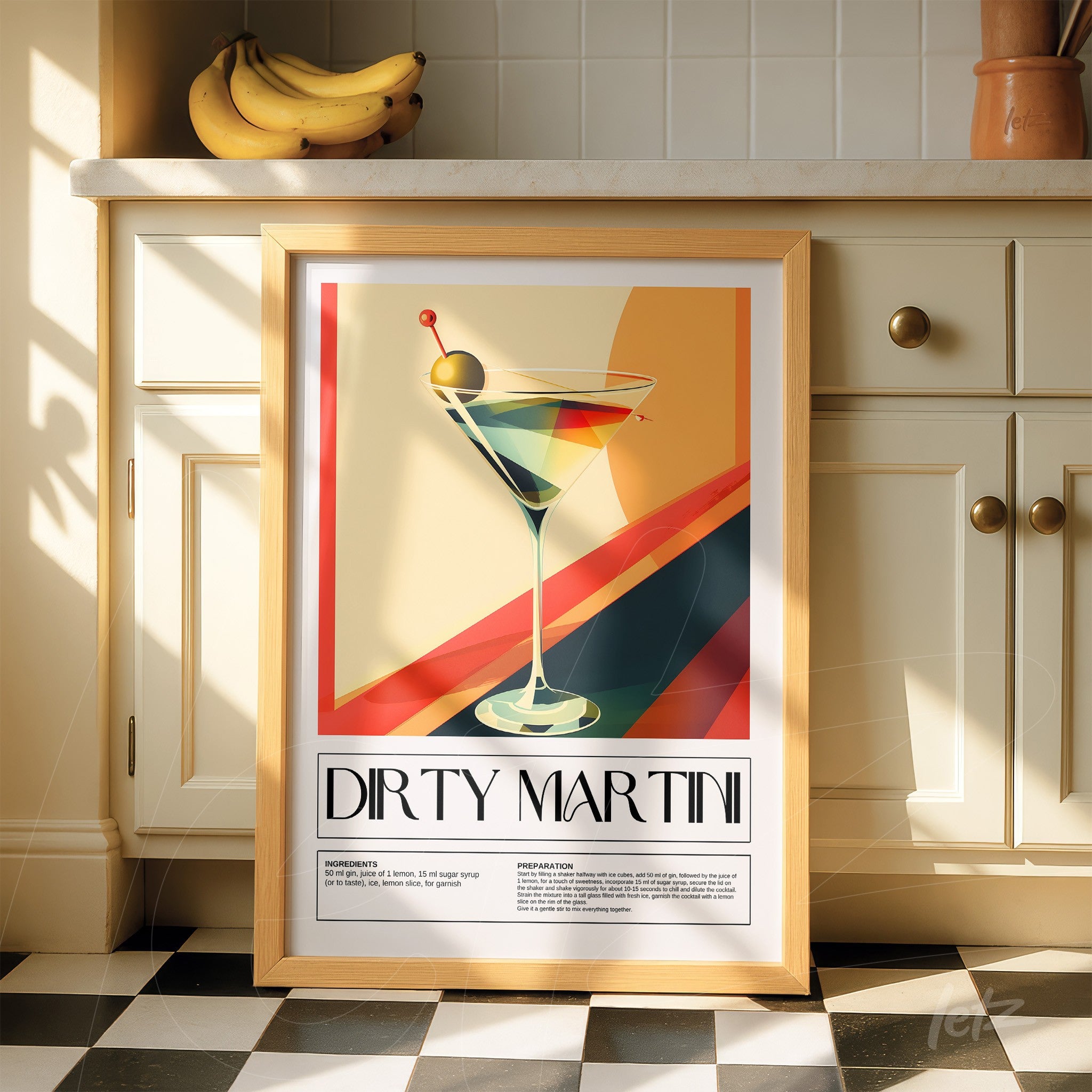 retro style framed artwork of dirty martini cocktail with light wood frame