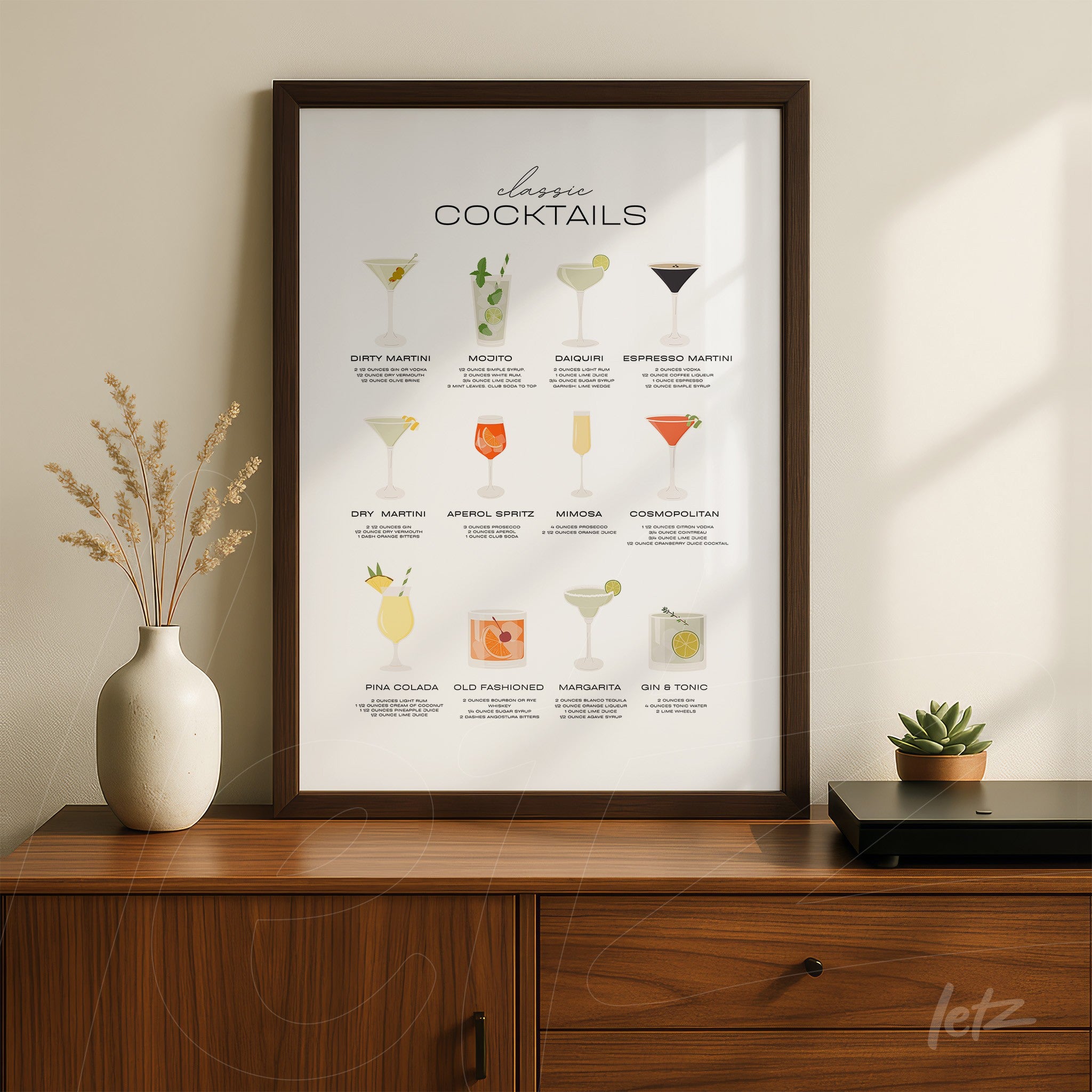 framed wall art featuring illustrations of classic cocktails on light background with brown frame