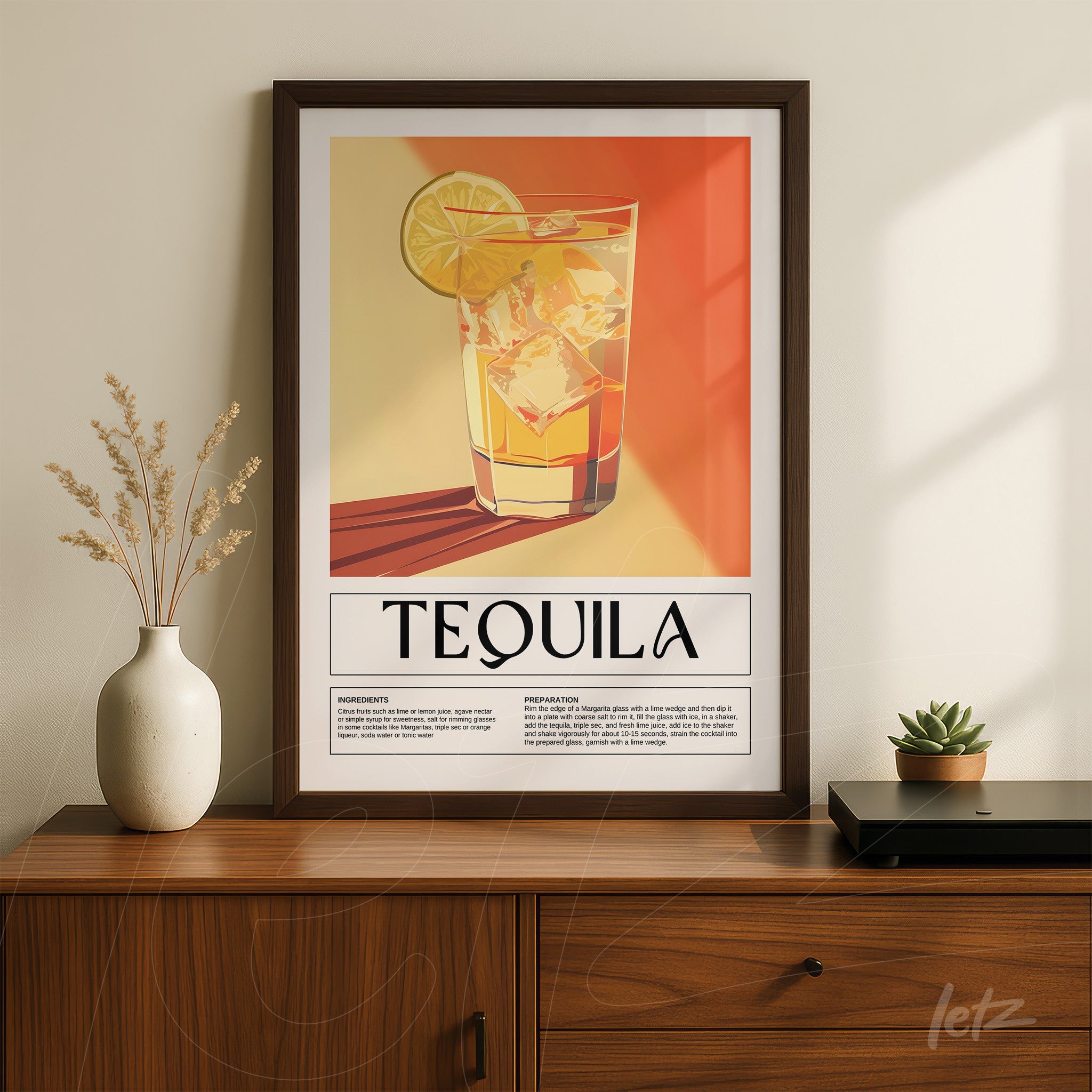 framed artwork of tequila drink with dark frame and textured orange and yellow background