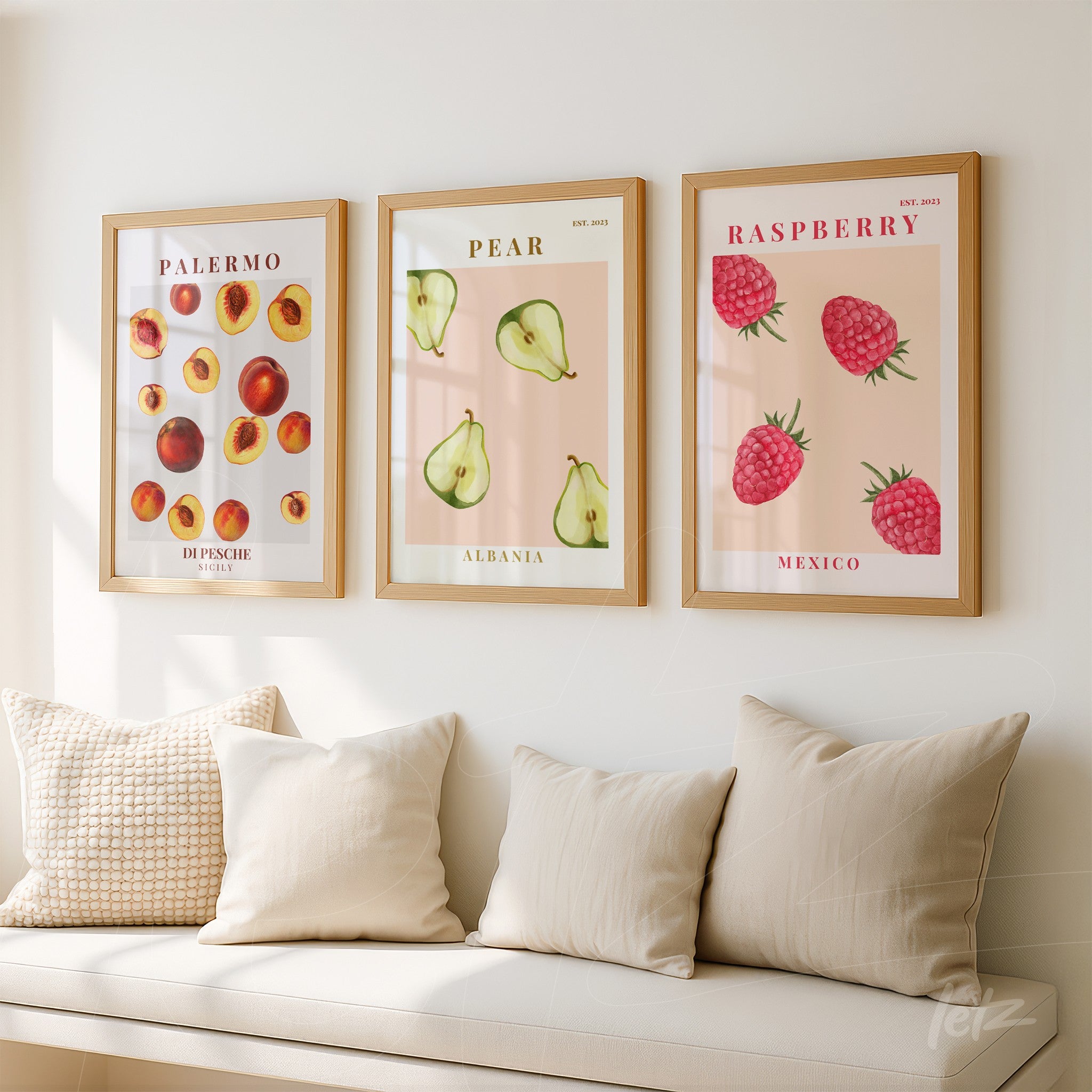 set of framed artworks showcasing illustrations of peaches, pears, and raspberries against a soft pink background