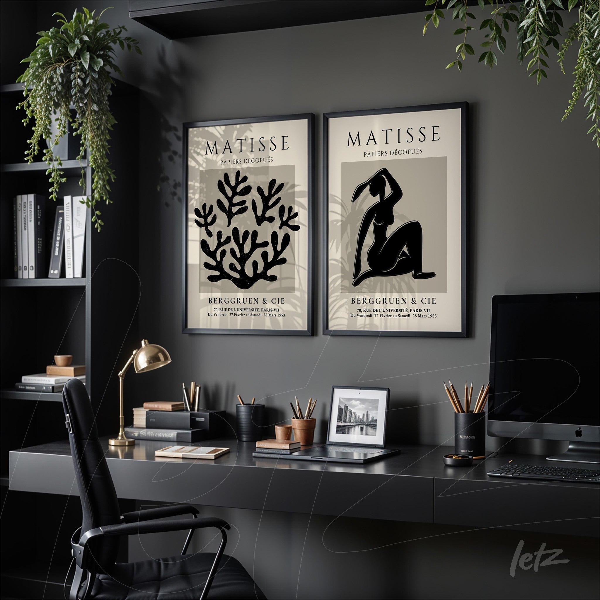 composition featuring two framed artworks in black frames displayed on a wooden desk, with retro style art inspired by Matisse, one showcasing a female silhouette and the other depicting coral design on a light background