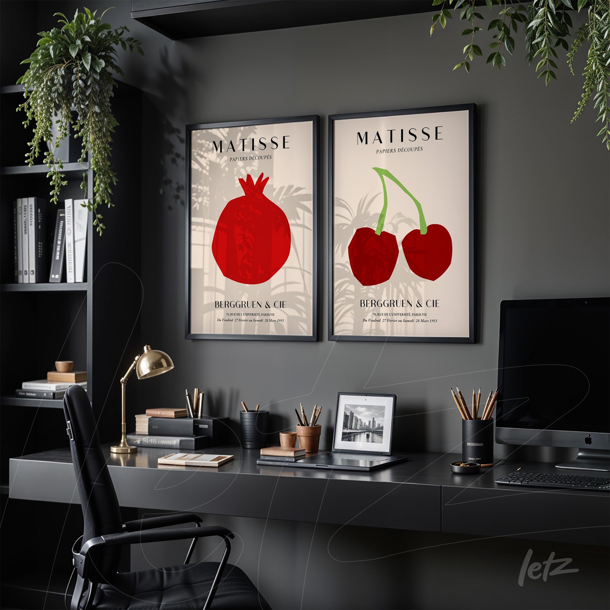 framed wall art composition featuring illustrations of pomegranate and cherries on dark wall