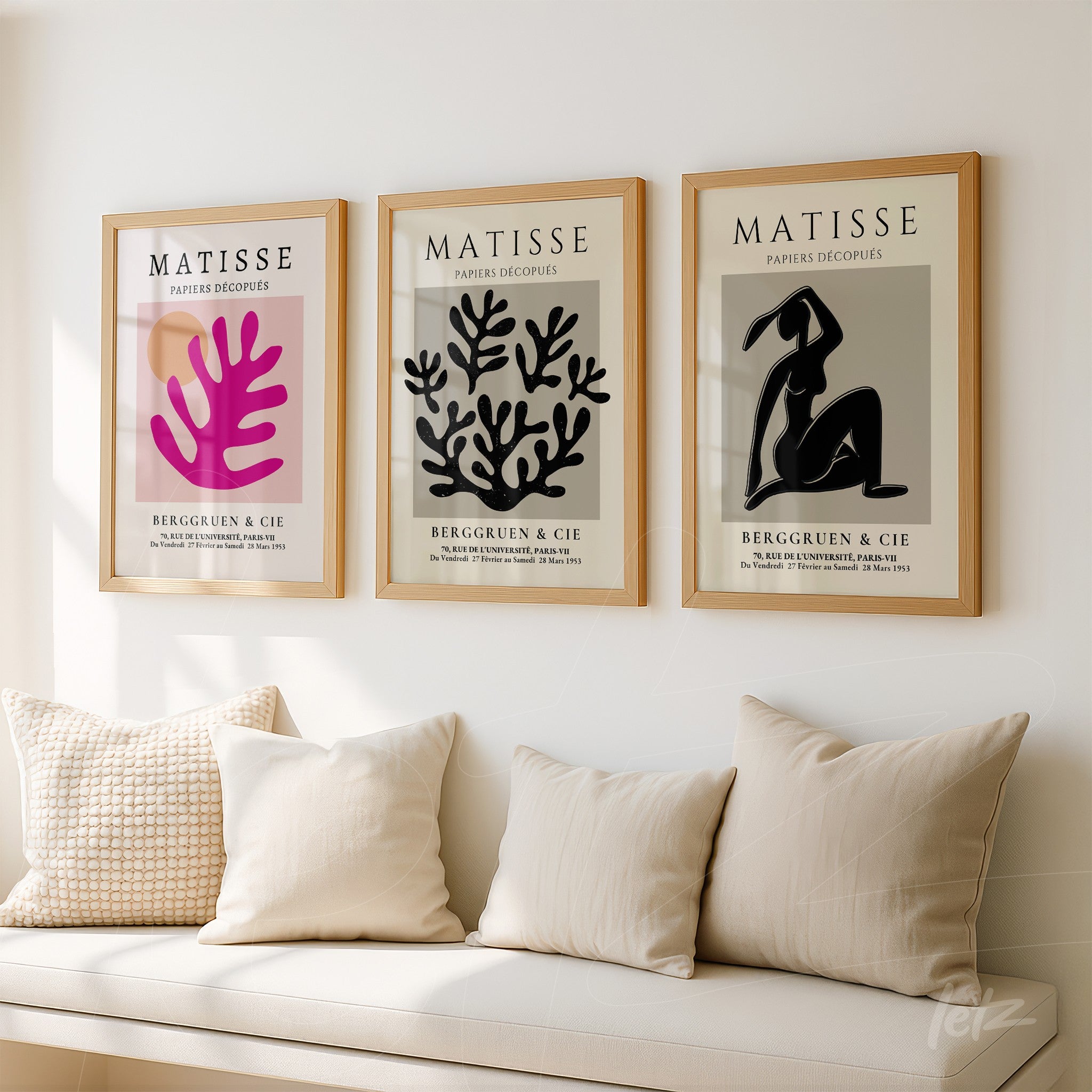 set of three framed artworks by Matisse displayed on a white wall, featuring a pink hand, coral leaves, and a black female figure