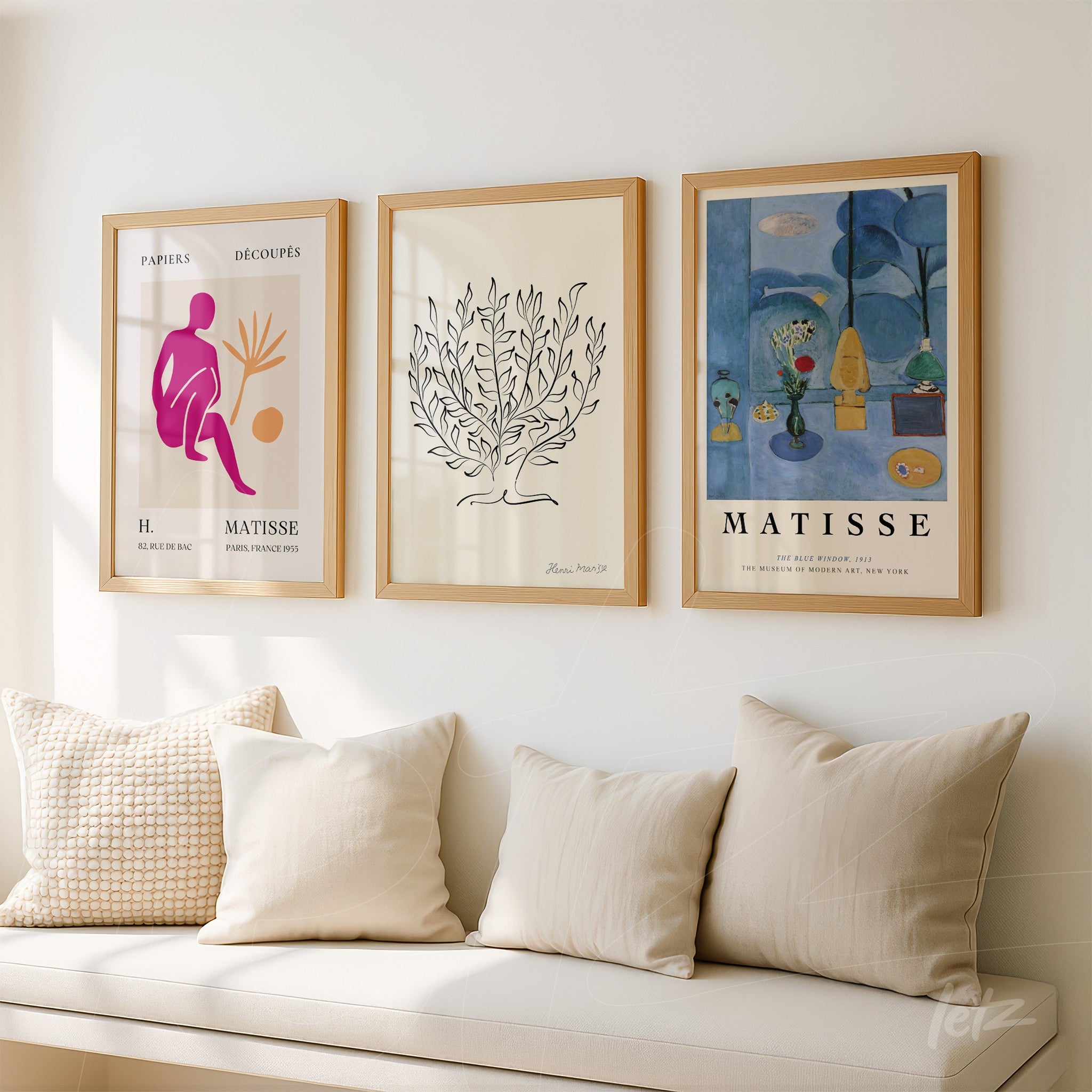 composition of modern art framed in light wood featuring a stylized figure of a person and a plant