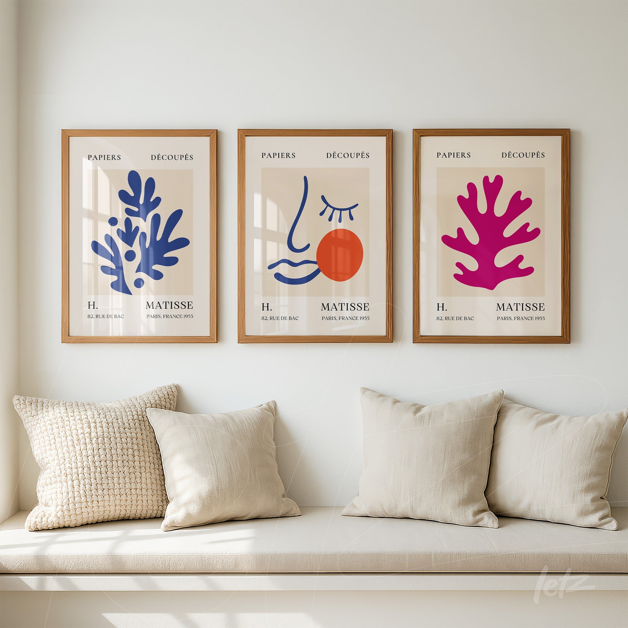 set of three framed artworks featuring abstract designs with organic shapes in vibrant colors