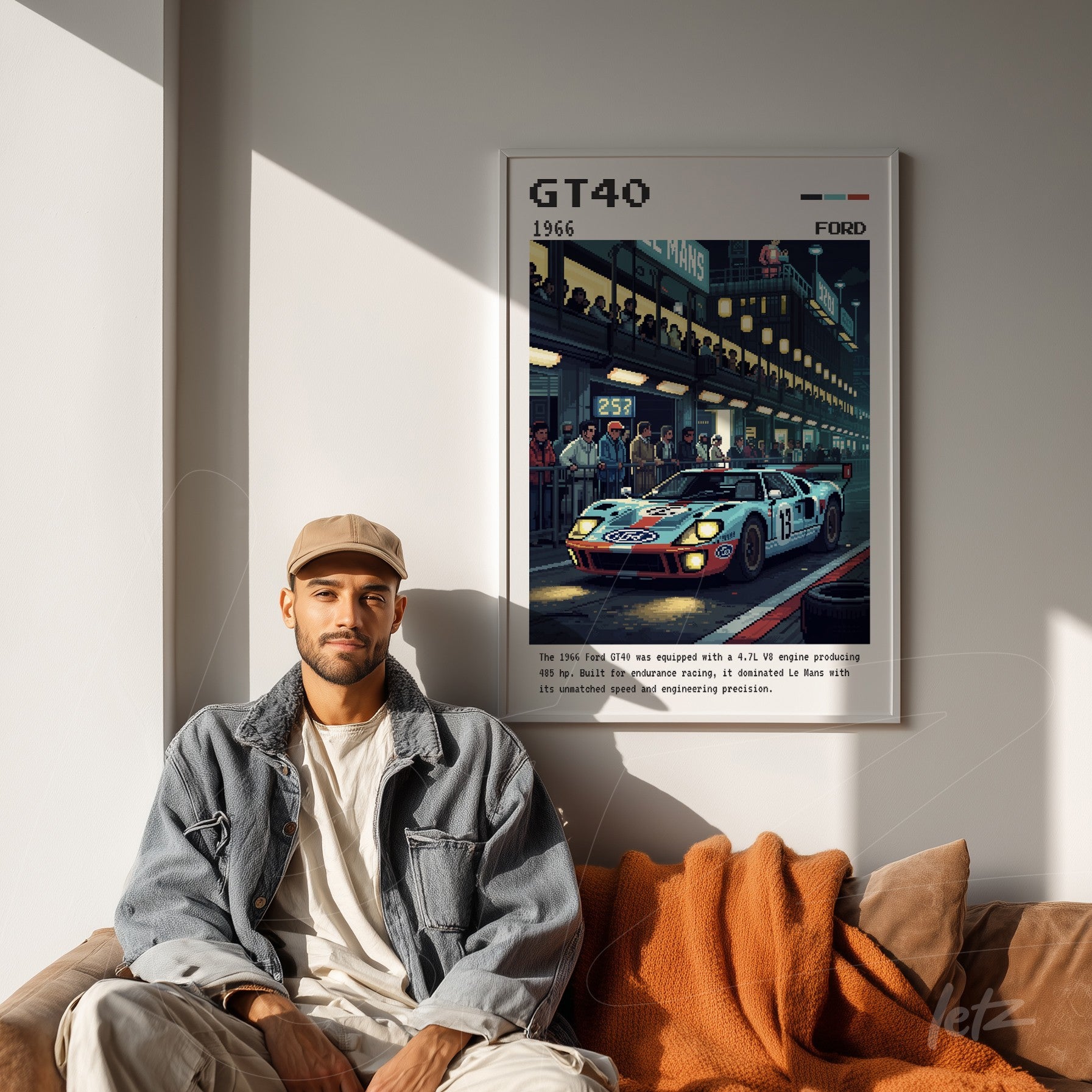 retro art print of Ford GT40 in a racing scene, framed in light wood, displayed in a modern setting with a neutral sofa