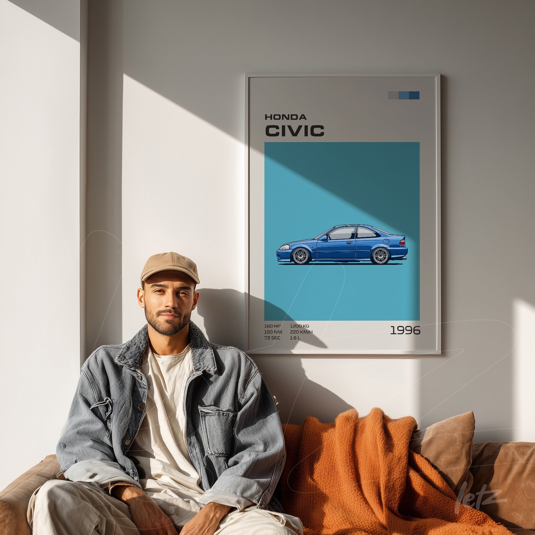 framed digital art of 1996 honda civic displayed above a sofa with orange blanket