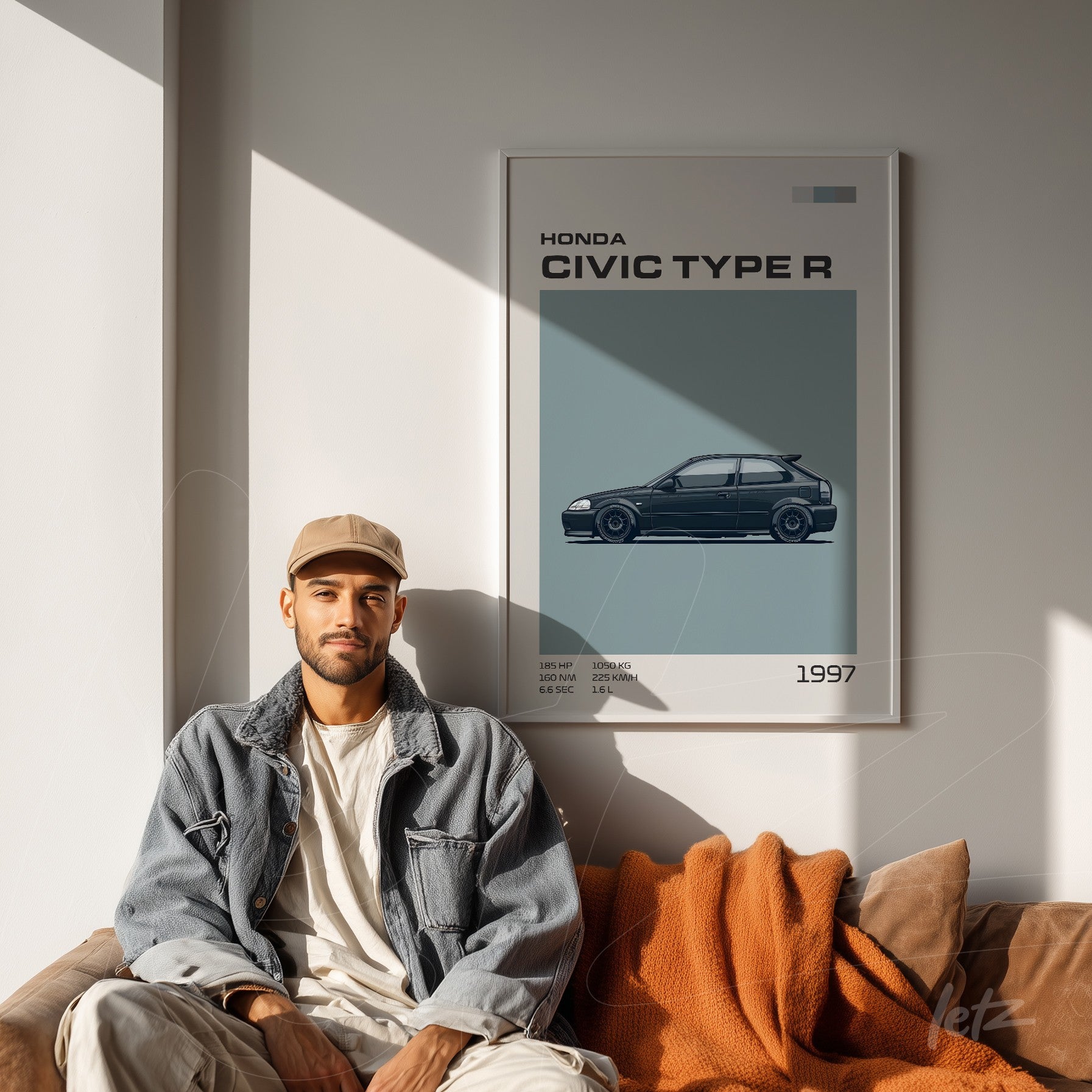 framed wall art featuring an illustration of the Honda Civic Type R in a white frame displayed in a minimalist setting with a brown sofa and orange blanket