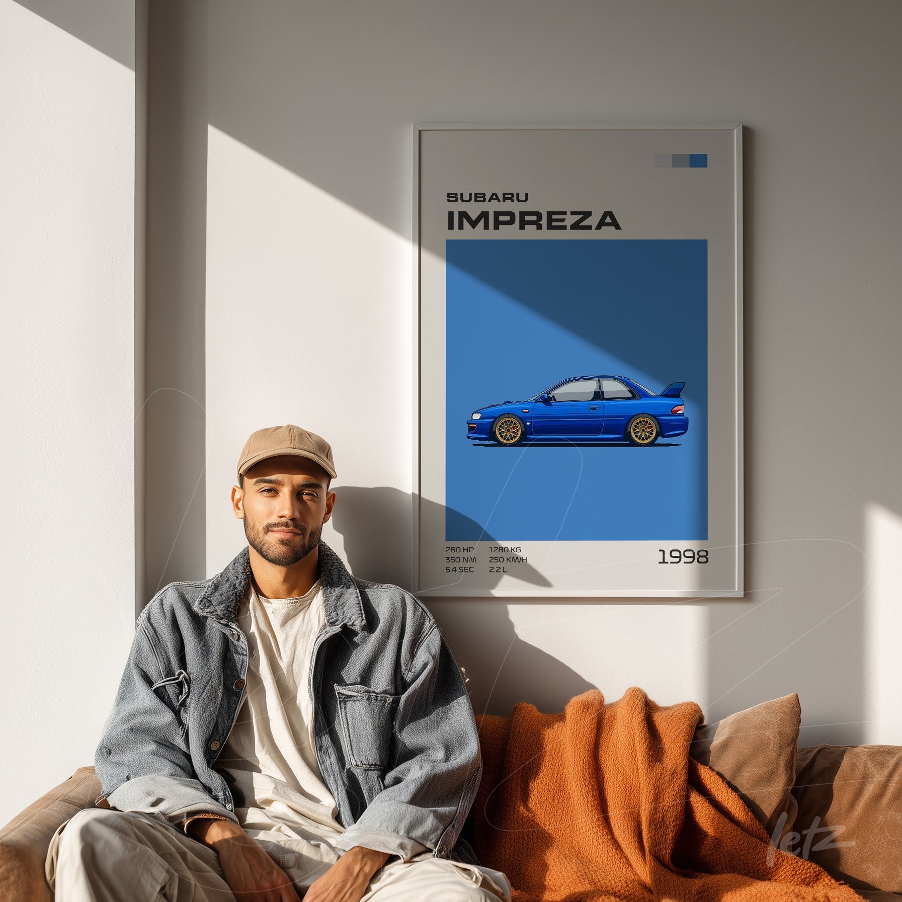 framed graphic art of a Subaru Impreza on a light wall with a man casually seated beside it