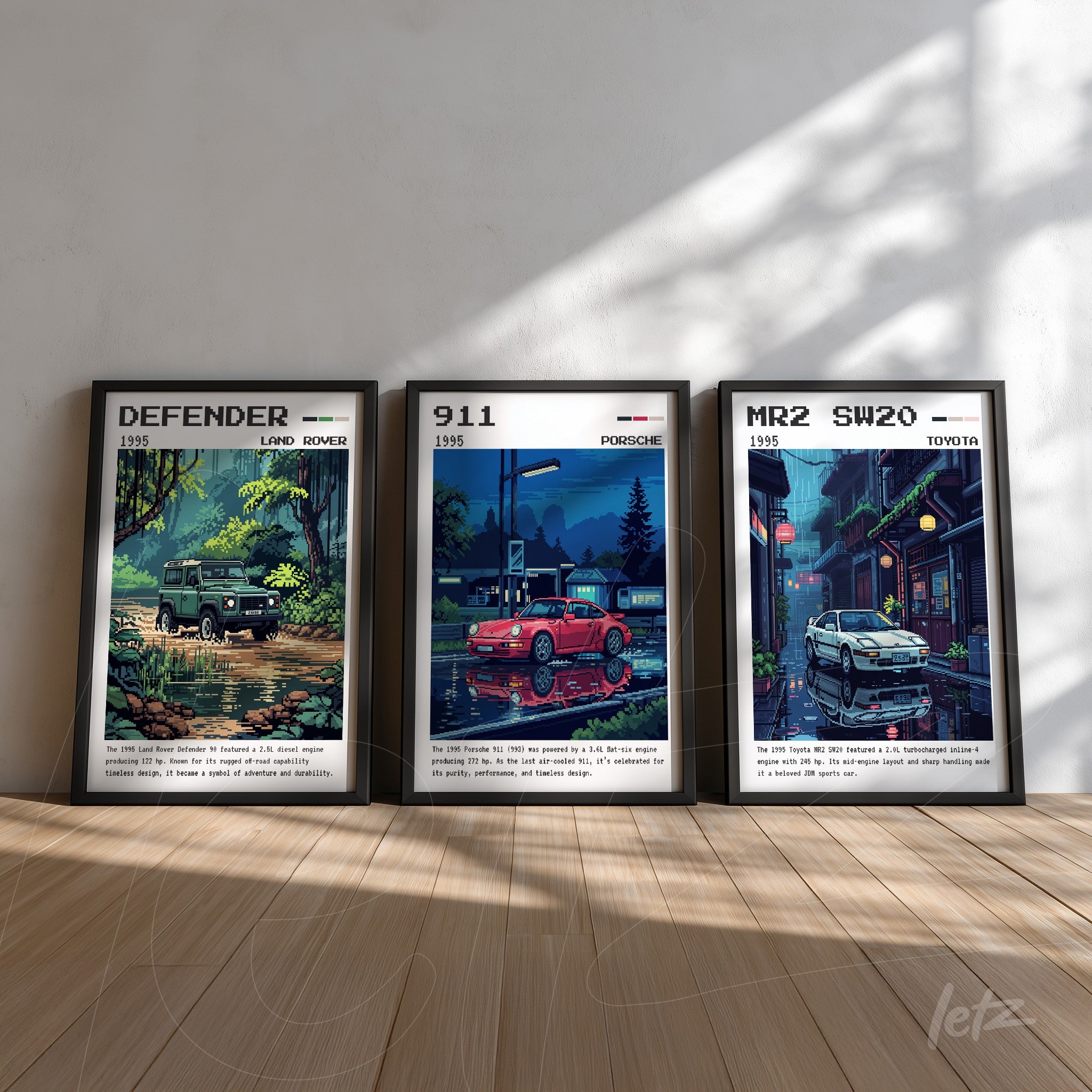 collection of framed prints featuring classic car illustrations, including a land rover defender in a green landscape, a porsche 911 on a lit street, and a toyota mr2 sw20 in a retro urban setting