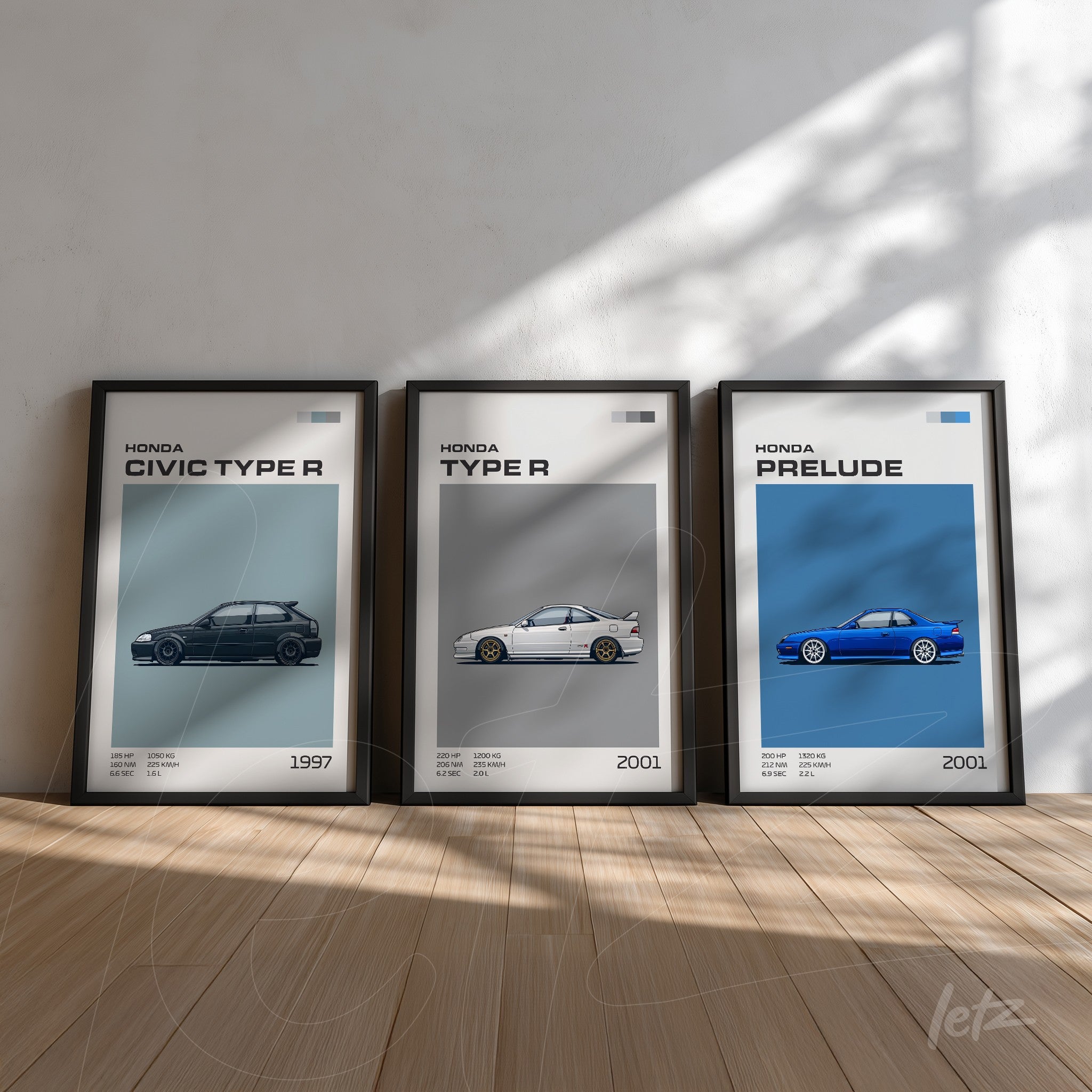 trio of framed artworks featuring Honda car illustrations including Civic Type R, Type R and Prelude, displayed on a wooden floor