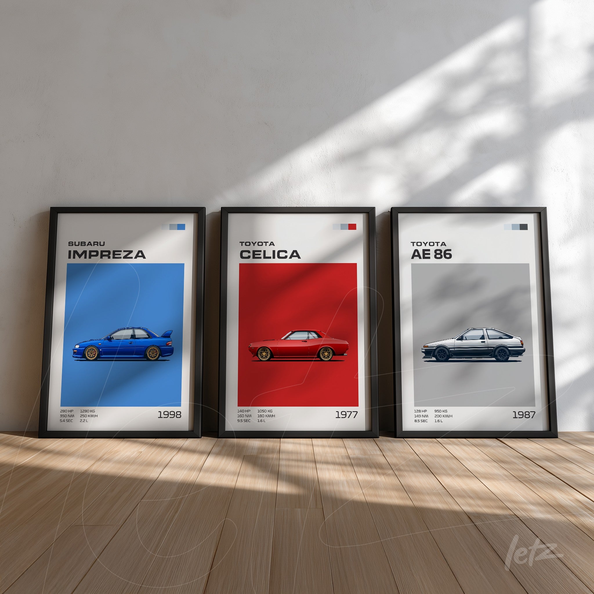 collection of three framed car artworks featuring a blue subaru impreza, a red toyota celica, and a white toyota ae 86, all in black frames