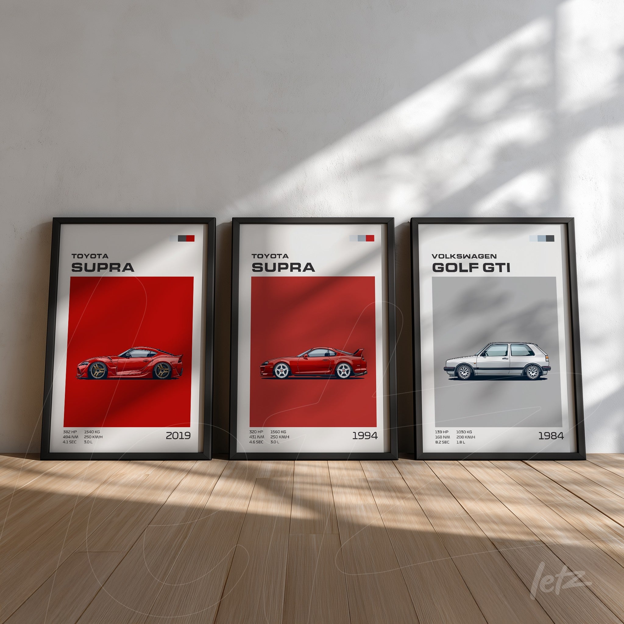framed wall art composition featuring a 2019 toyota supra, a 1994 toyota supra, and a 1984 volkswagen golf gti against red and white backgrounds