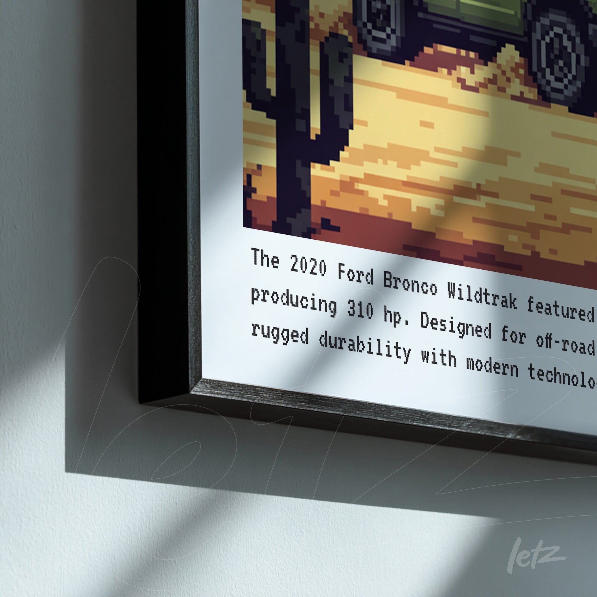 framed retro-style digital art of the Ford Bronco Wildtrak off-road vehicle with a black frame