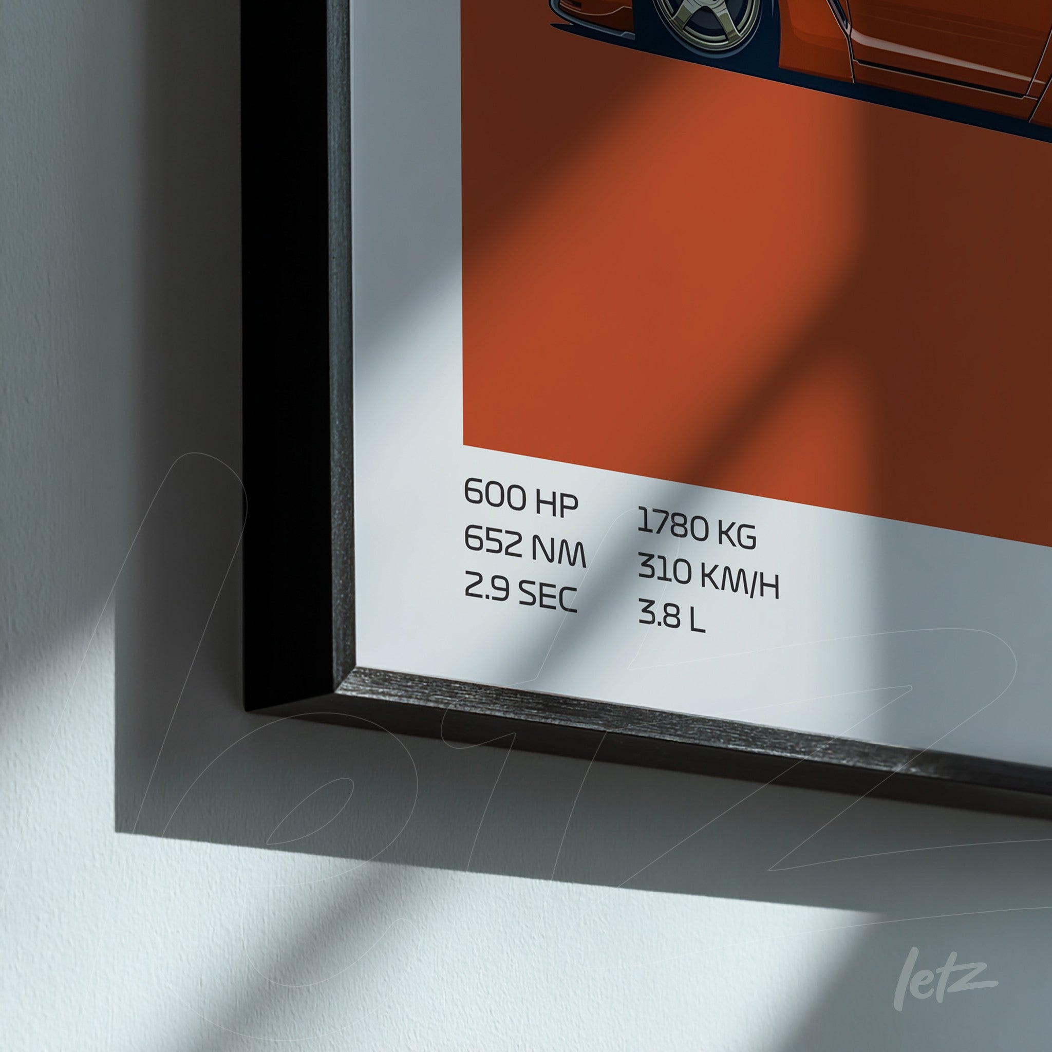 framed automotive art on orange background featuring technical specifications of a car