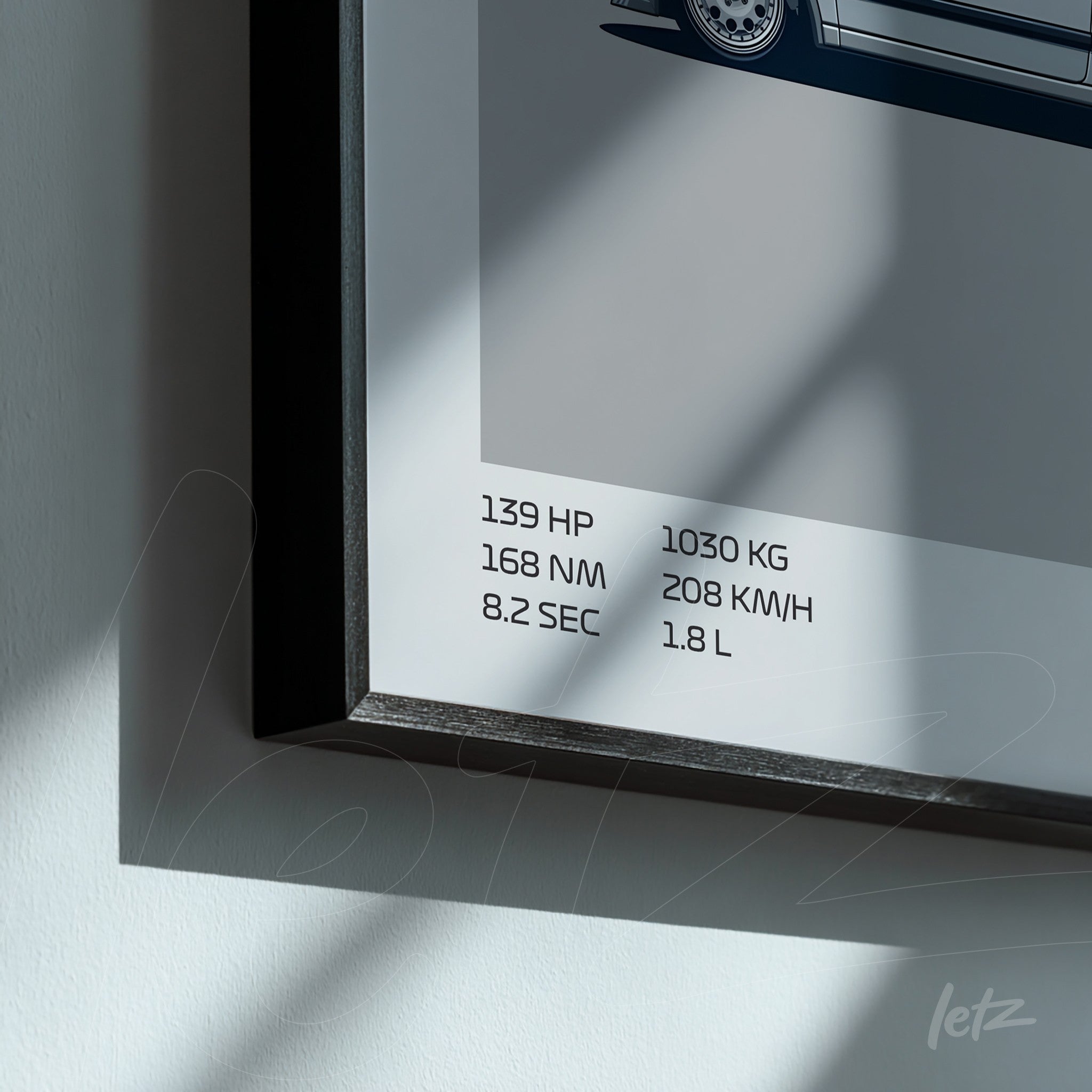 framed wall art featuring a technical illustration of a car with detailed text in black frame