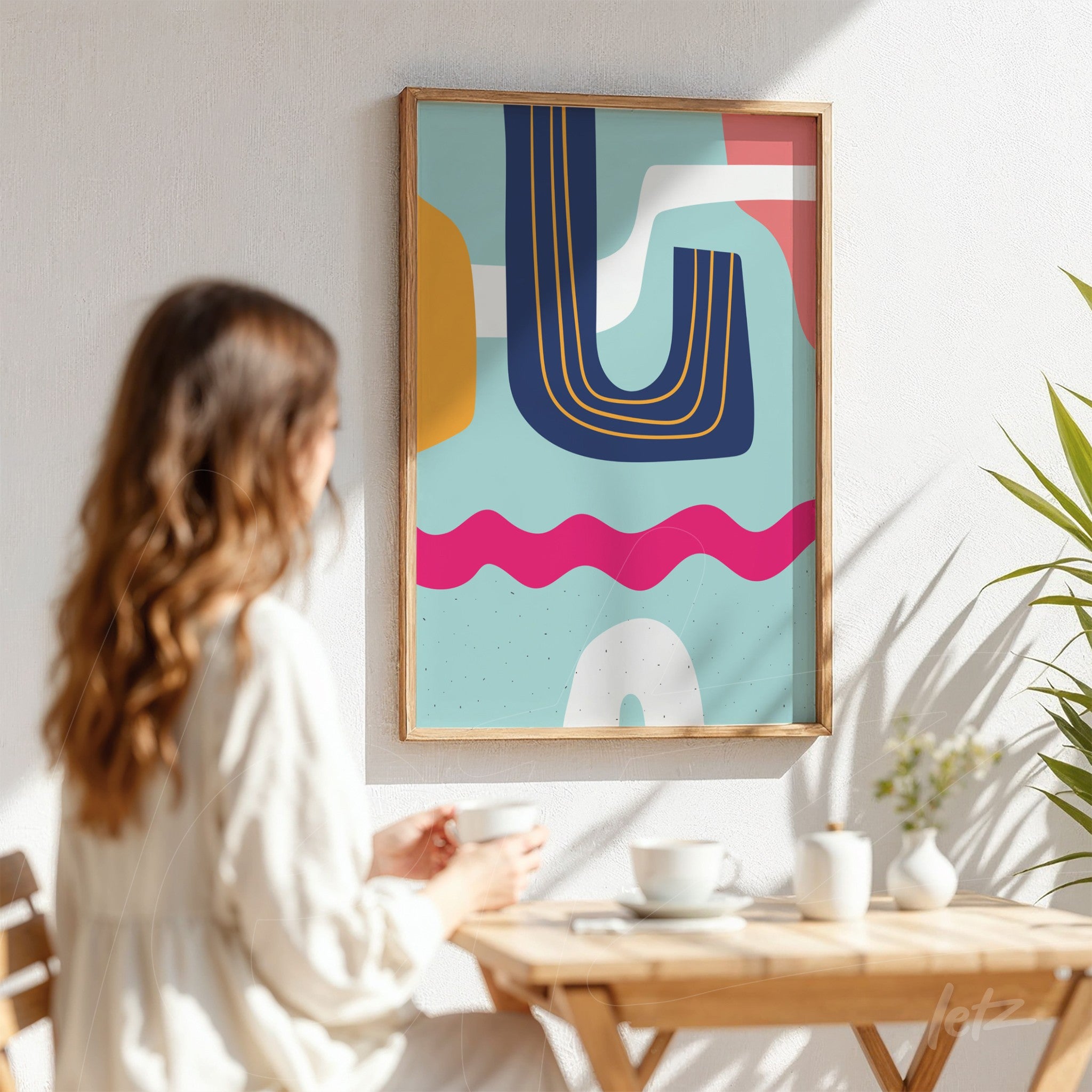 ```json
{
"alt": "quadro com arte abstrata boho em cores vibrantes exibido em moldura de madeira clara sobre parede branca",
"alt_en": "boho abstract art in vibrant colors displayed in a light wood frame on a white wall"
}
```