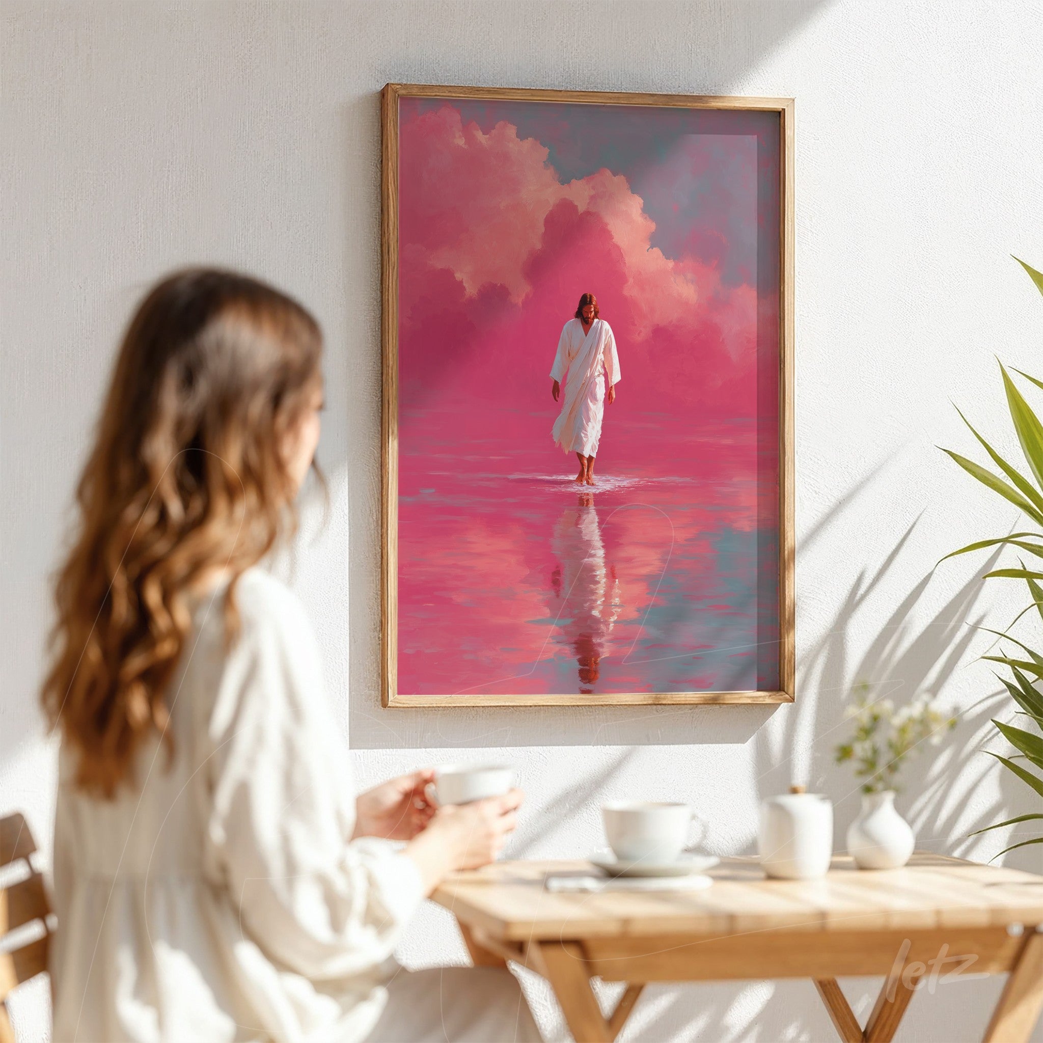 framed digital art of a human figure walking on reflective water with soft pink background and light wood frame