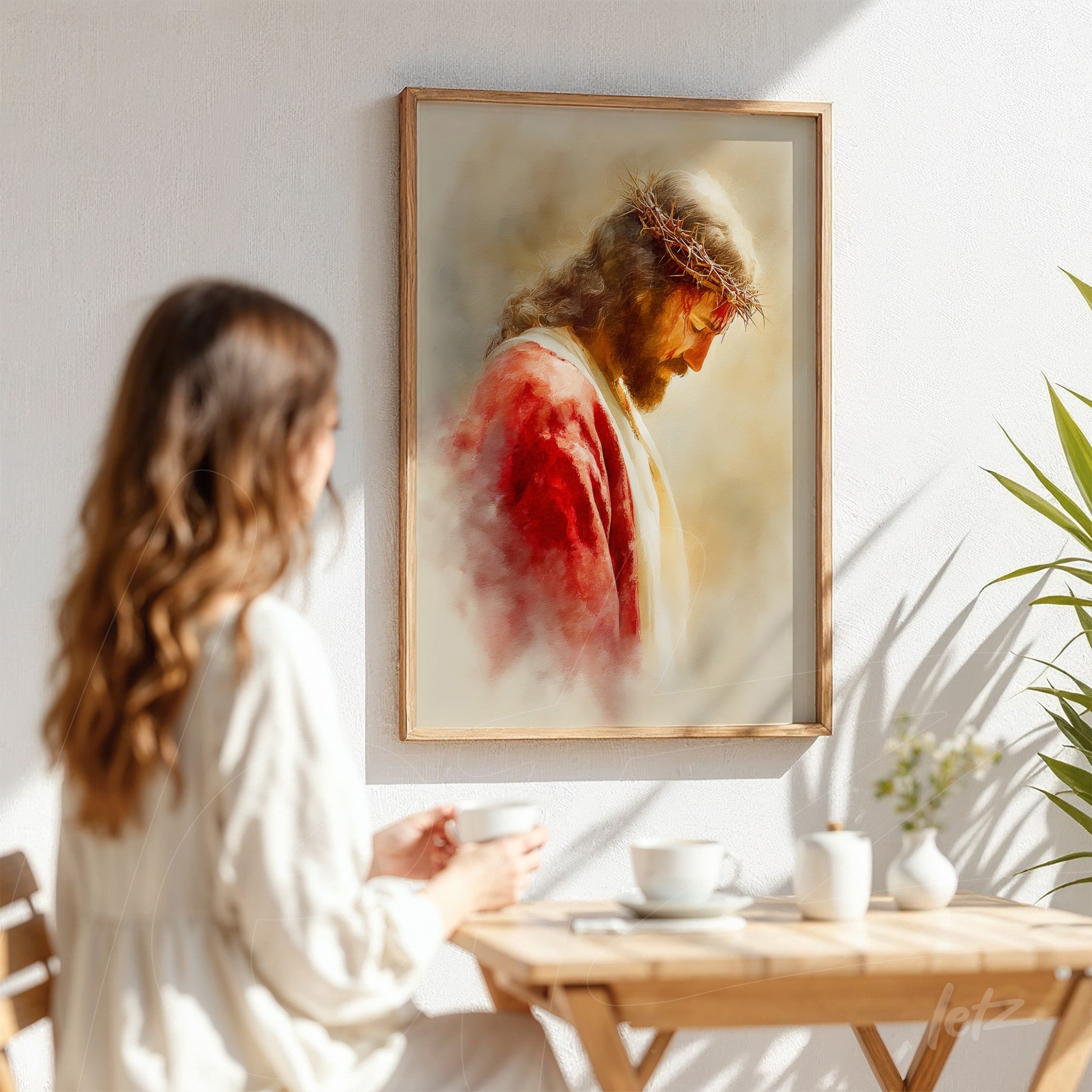 framed artwork of Jesus portrait in soft tones with a faded background displayed on a light wall