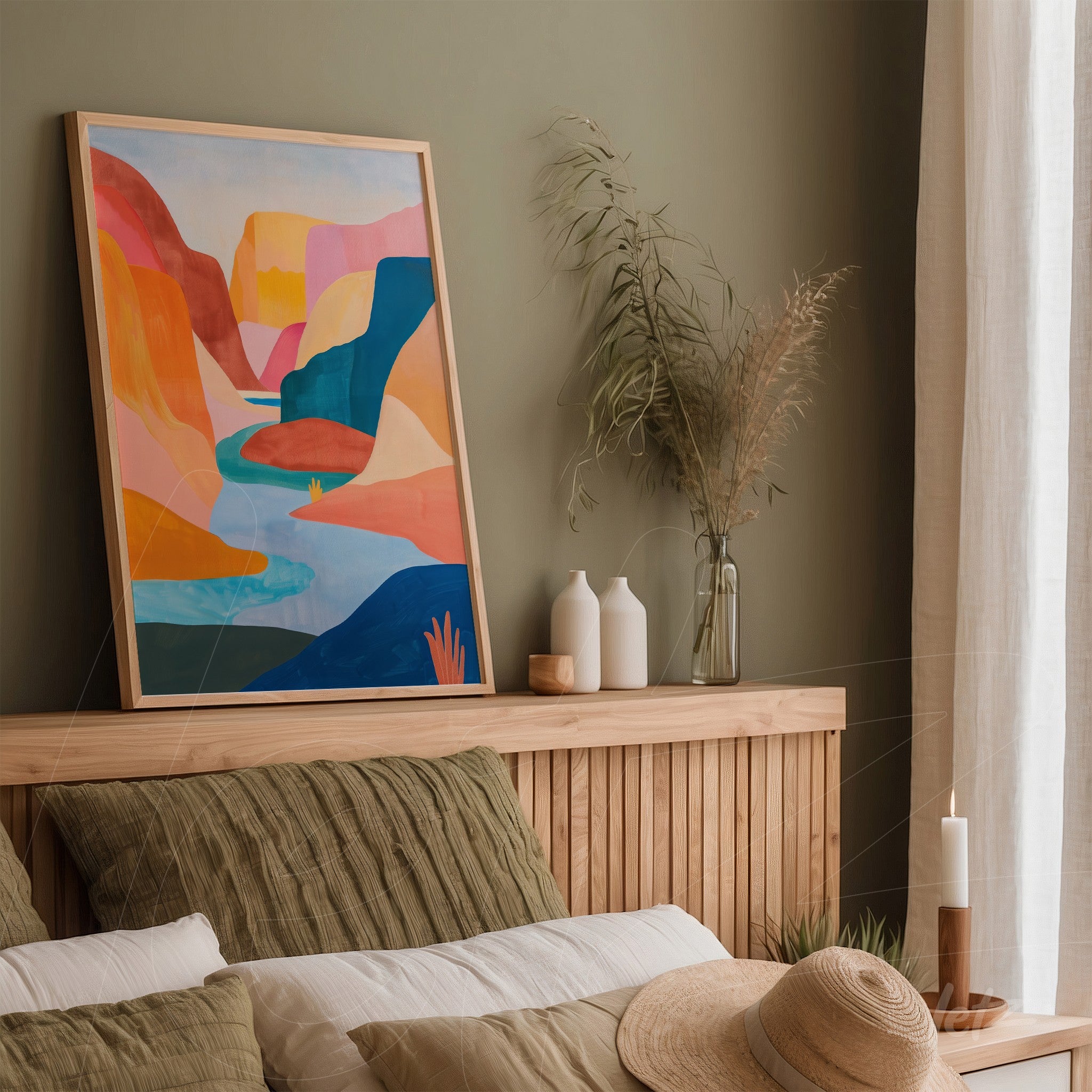 framed abstract art depicting warm-toned mountain landscapes in a light wood frame