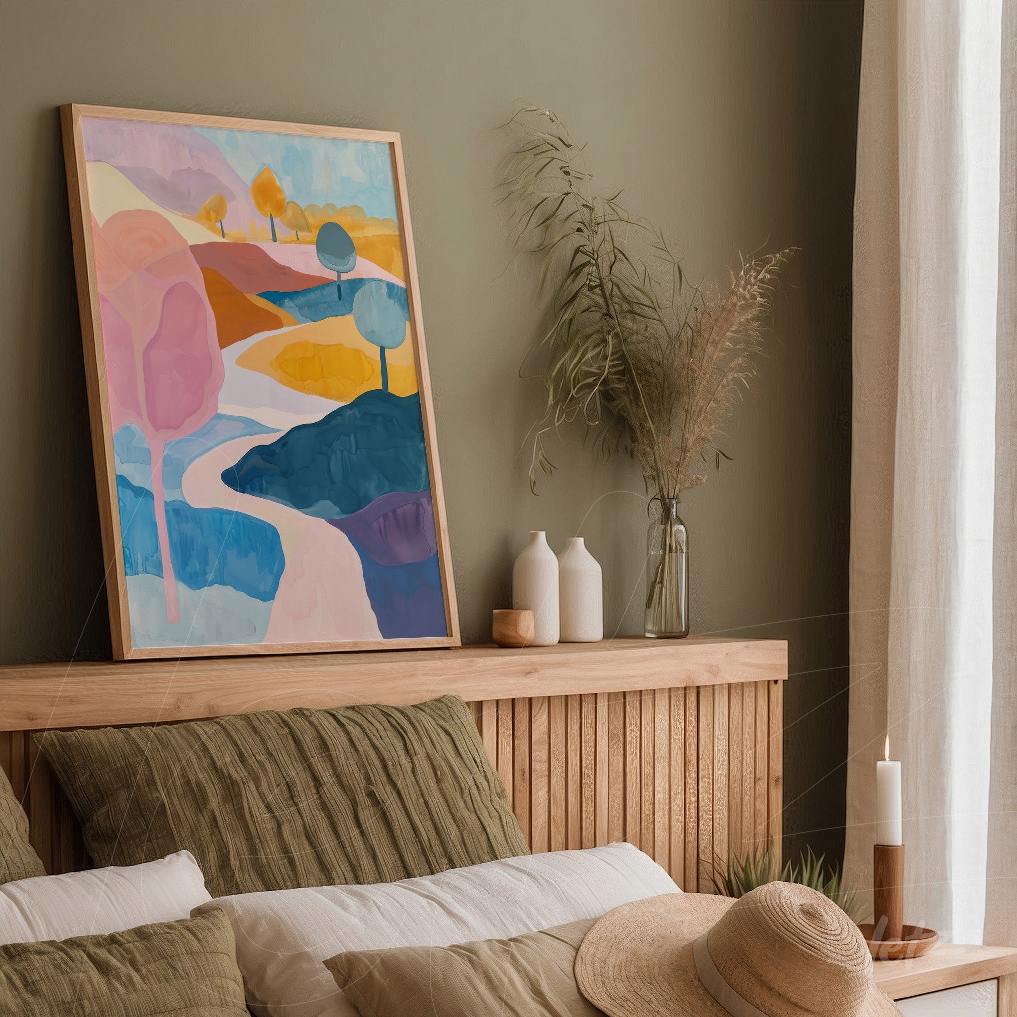 framed abstract landscape artwork in pastel colors displayed on a wooden headboard in a cozy setting