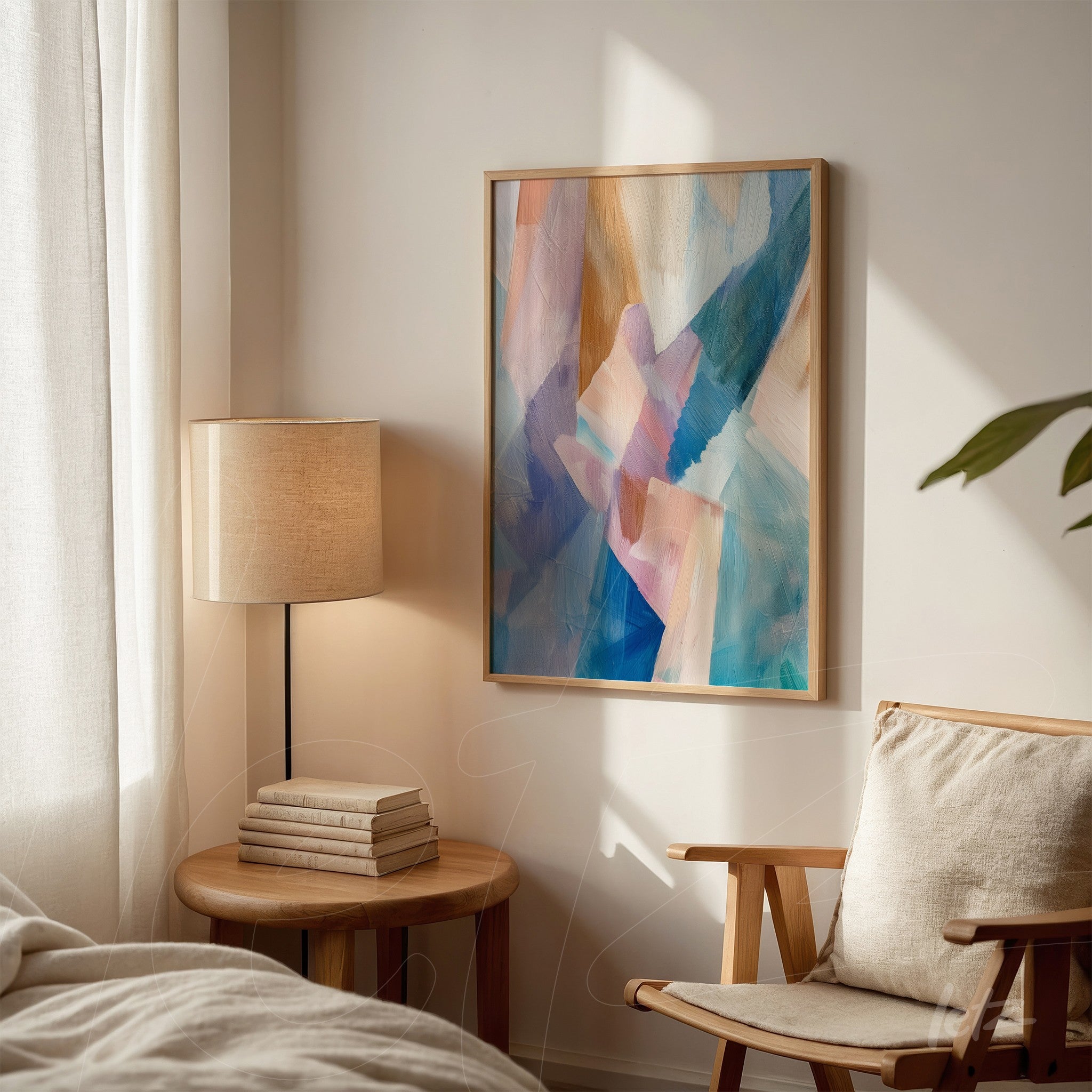 framed abstract art piece in shades of blue and pink, featuring a fluid and vibrant composition on a light wall