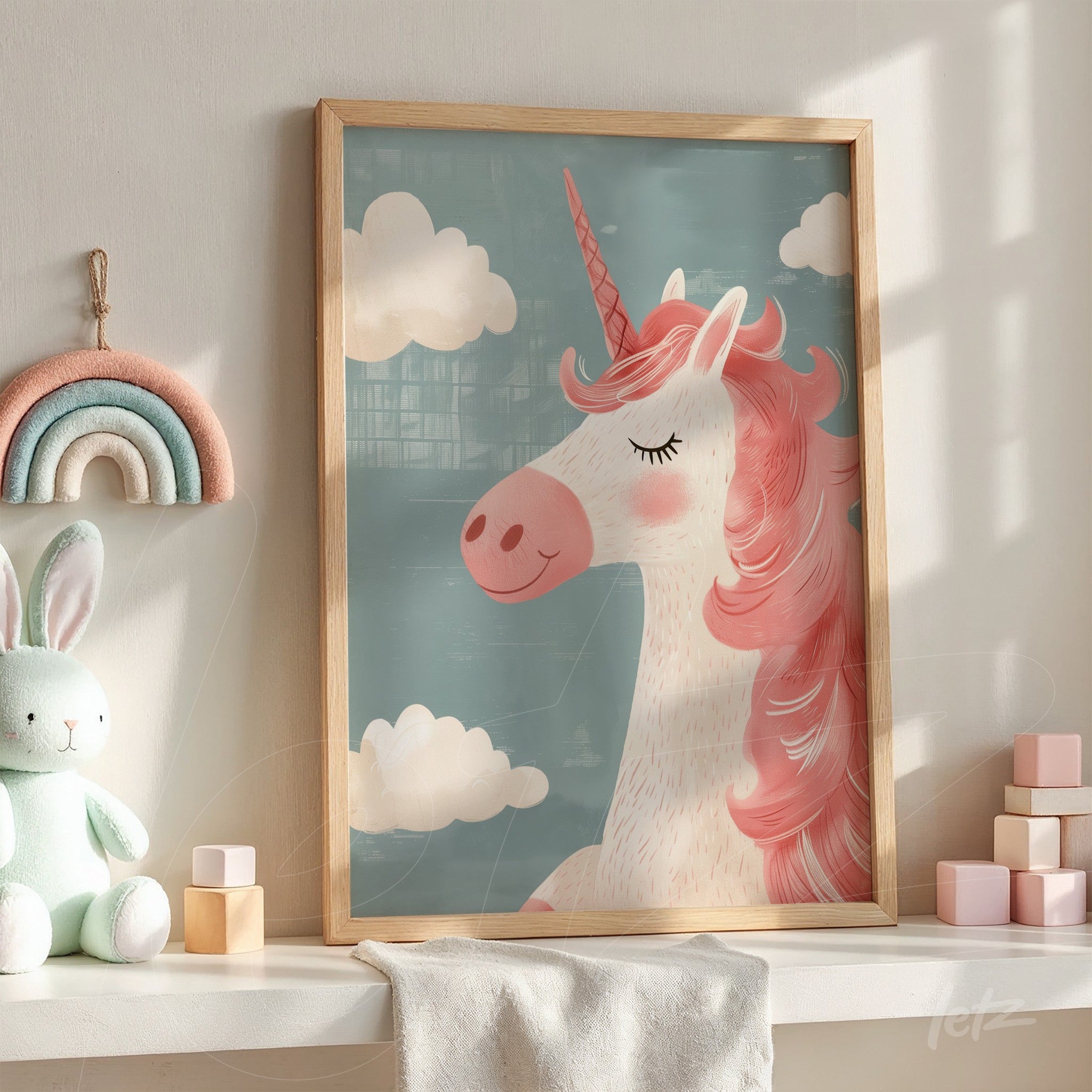framed artwork of a unicorn with a light blue background and clouds, featuring a light wood frame