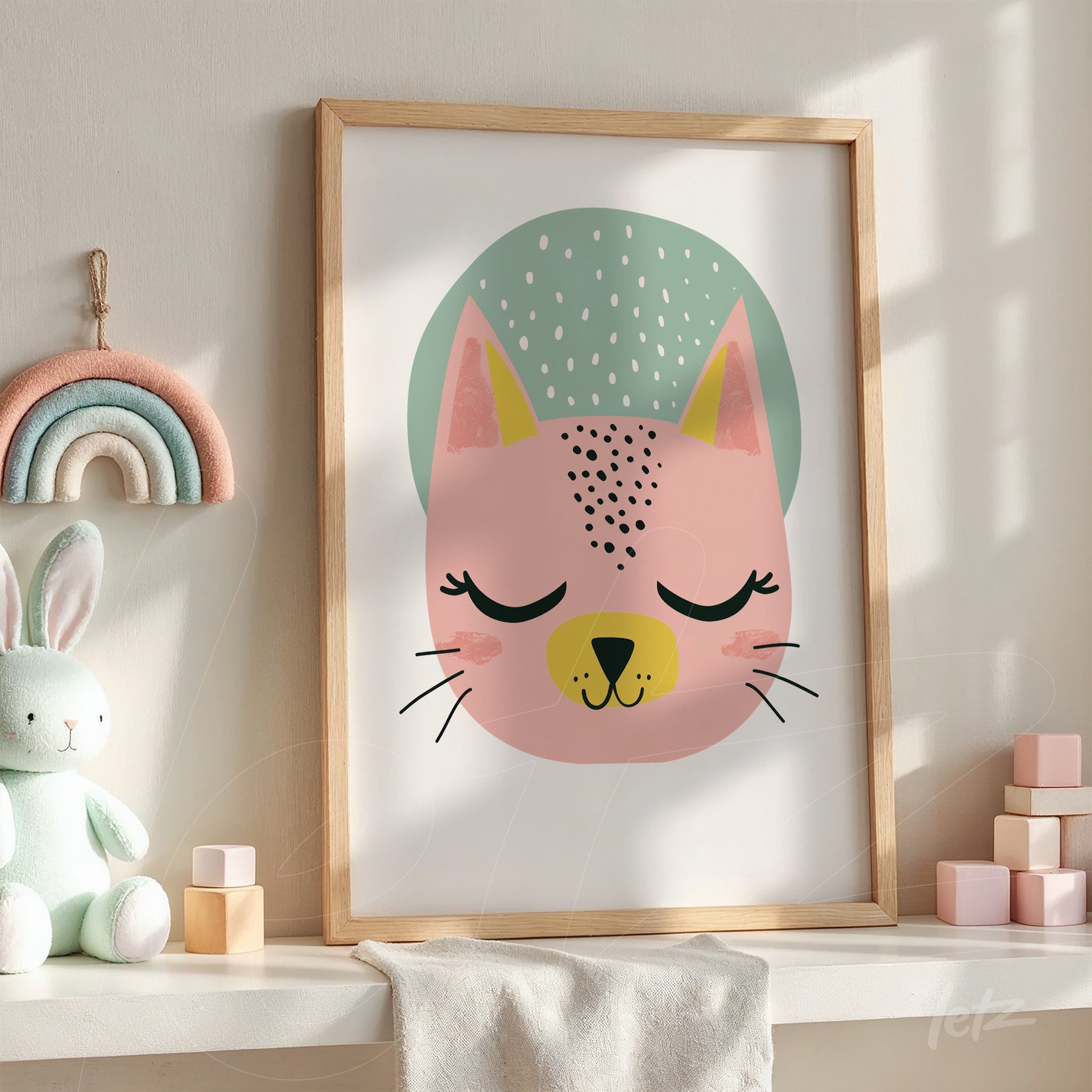 framed wall art featuring a pink cat illustration with a light wood frame, set against a green circle and rain drops